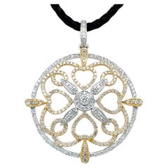 RUCHI Collier pendentif croix en or bicolore et diamants