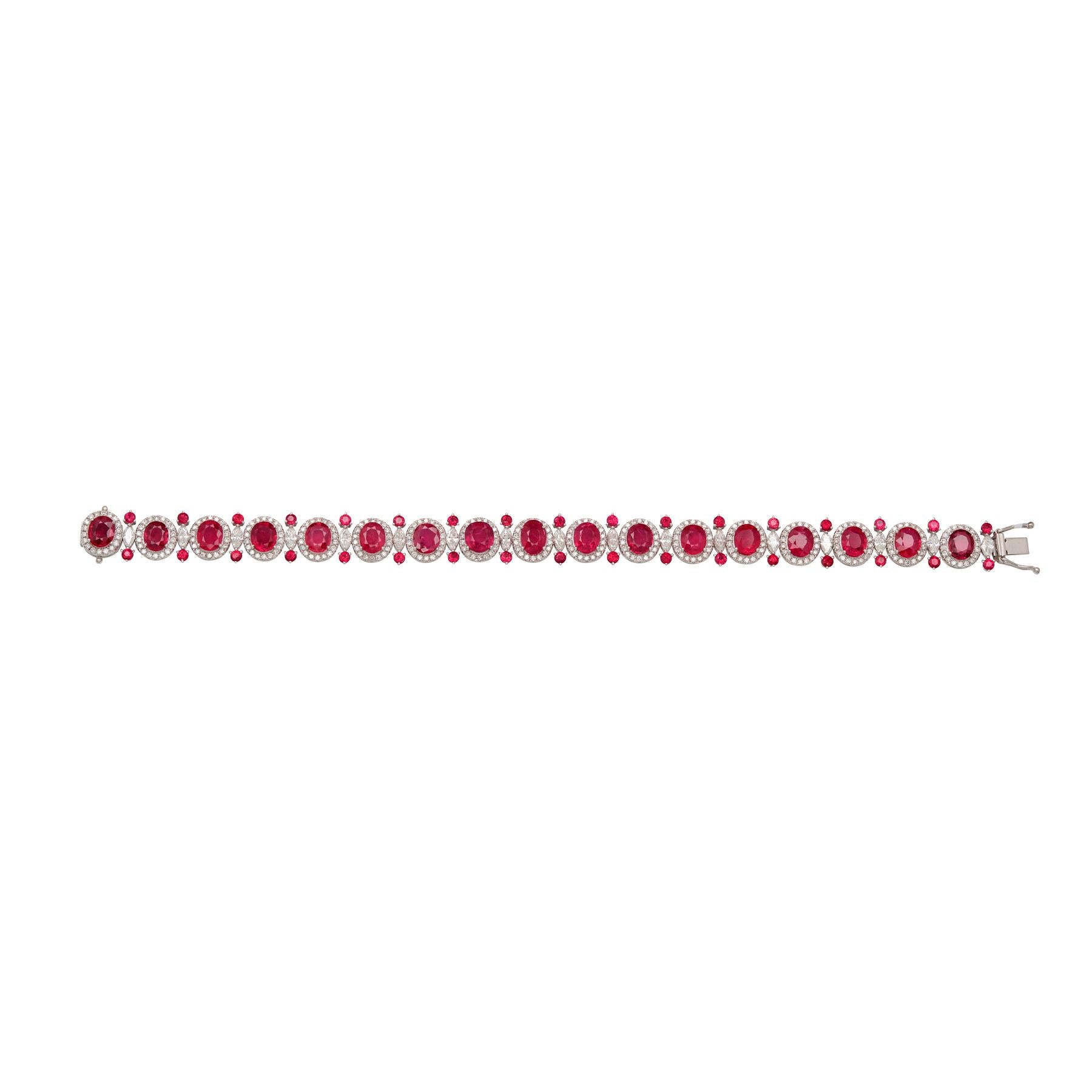 18K White Gold
Ruby: 15.10ct total weight.
Diamond: 3.37ct total weight.
All diamonds are G-H/SI stones.