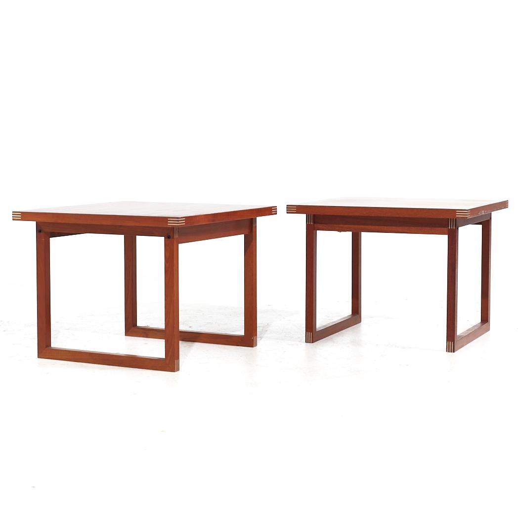 Rud Thygesen for Heltborg Møbler Mid Century Danish Teak Side Tables - Pair

Each side table measures: 23.5 wide x 23.5 deep x 18 inches high

All pieces of furniture can be had in what we call restored vintage condition. That means the piece is