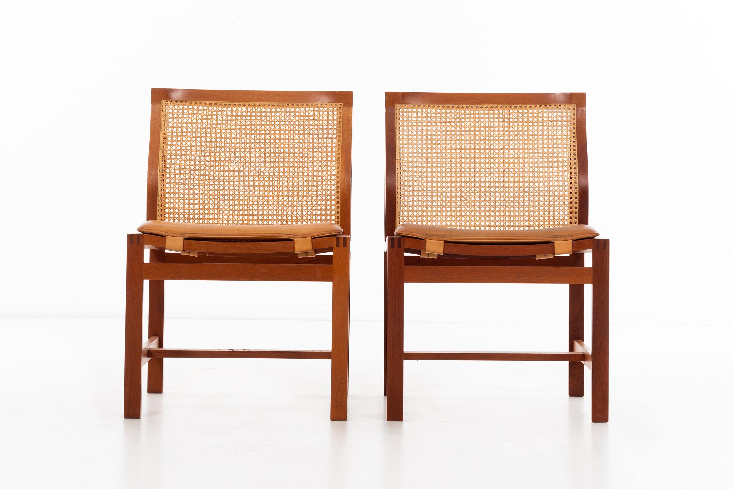 Thygesen and Sorensenset dining chairs for Botium Denmark,
Teak frame with cane seat and back, back has lower convex curve for lumbar support, leather seats. All wear of leather seats shown image.
Signed with decal manufacturer’s label to