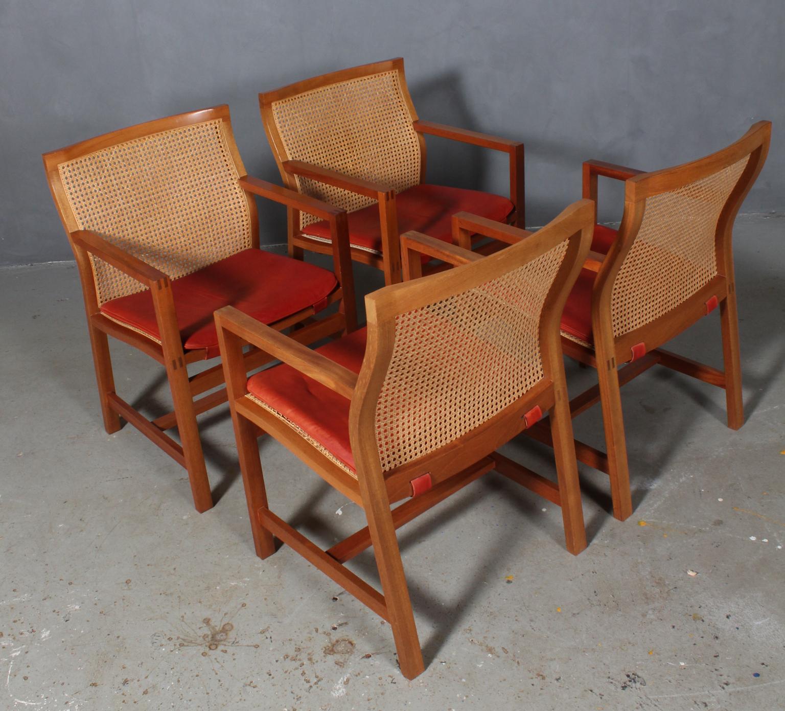 Rud Thygesen & Johnny Sørensen set of four armchairs with frame of solid mahogany.

Cane in the back and seat, original anilin leather cushion.

From 