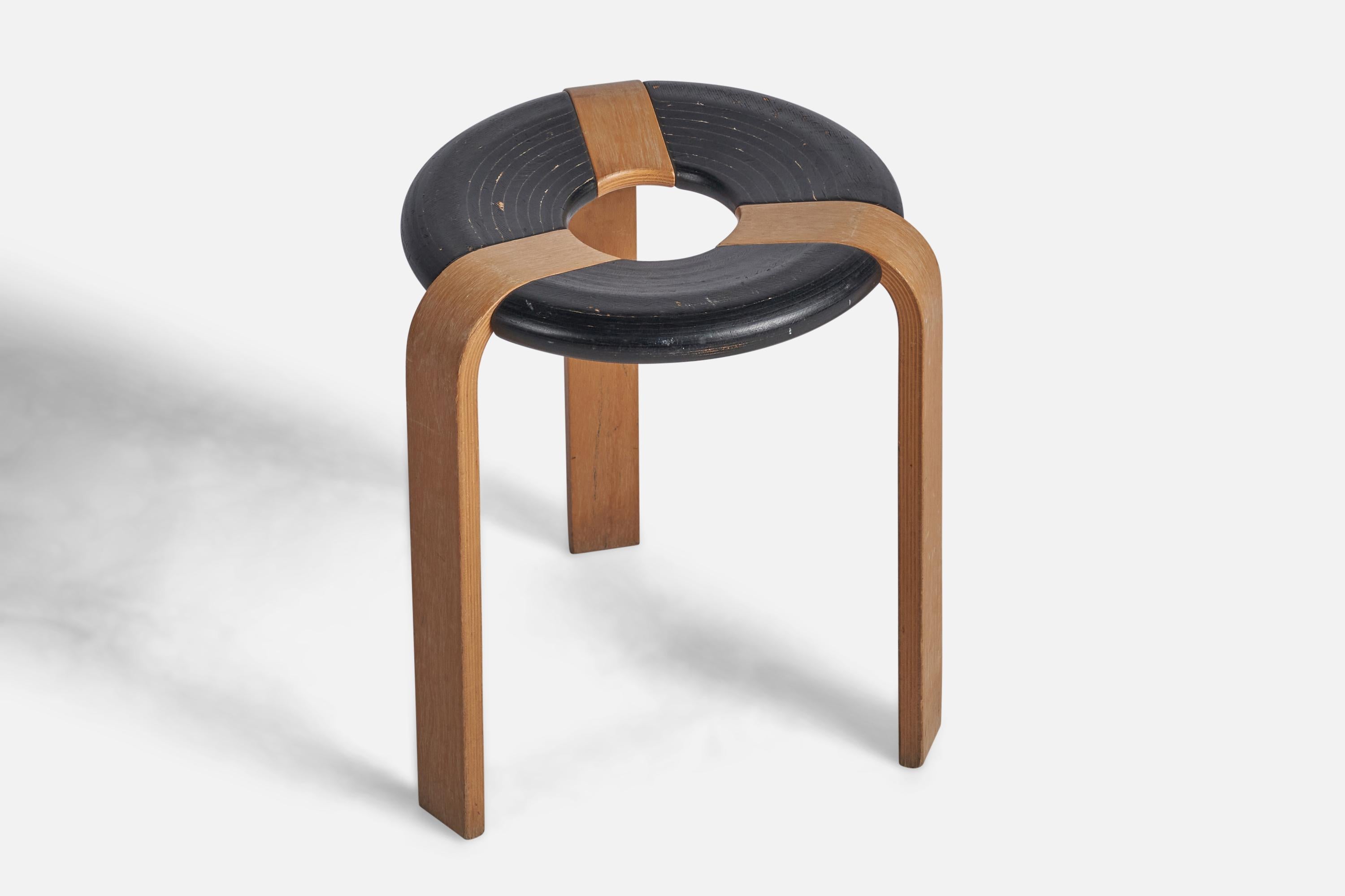 A black-painted oak stool designed by Rud Thygesen and produced by Magnus Olsen, Denmark, 1970s.