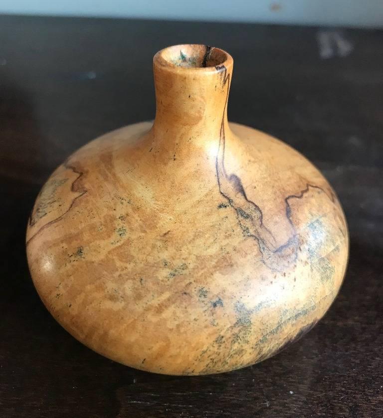 A beautifully executed, handmade, spalted maple turned vase by Rude Osolnik who is widely regarded, along with Bob Stocksdale, as one of the finest woodturners in American woodturning history. In 1992, he was presented by then Kentucky Governor