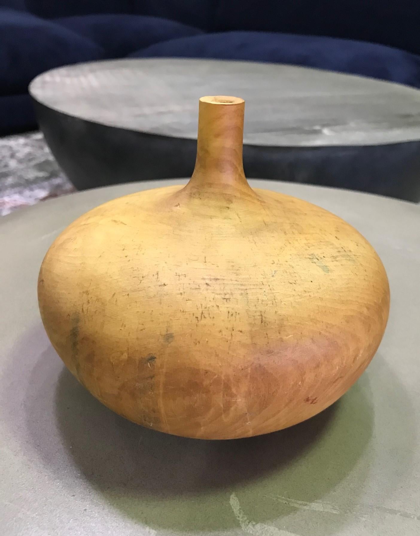 A beautifully executed, handmade, buckeye wood turned vase by Rude Osolnik who is widely regarded, along with Bob Stocksdale, as one of the finest woodturners in American woodturning history. In 1992, he was presented by then Kentucky Governor