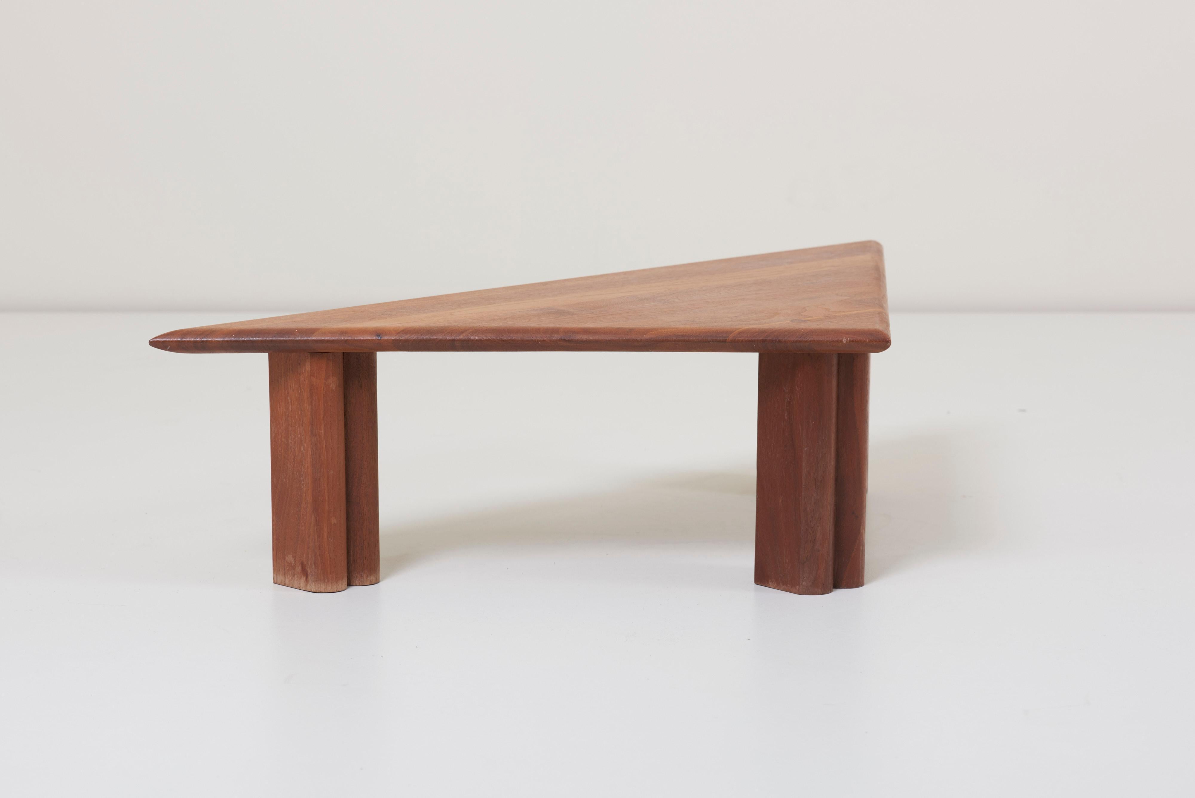 A studio crafted, organically shaped, wooden coffee table by American woodturner Rude Osolnik. Osolnik mostly made smaller pieces like bowls and candle sticks, but he also made some furniture.

 