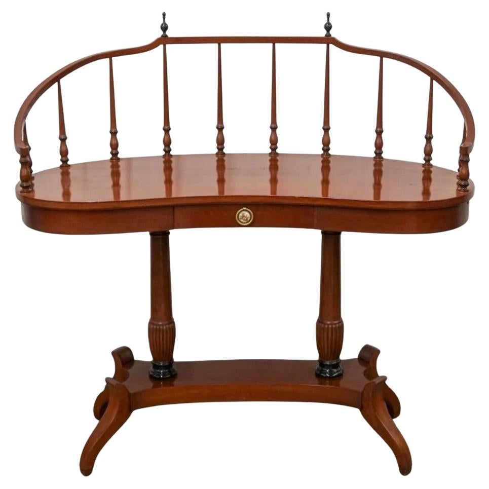 A Ruder Brothers Furniture New York Duncan Phyfe Style Mahogany Kidney Desk with pull out Trays extensions.
Measures 41.5