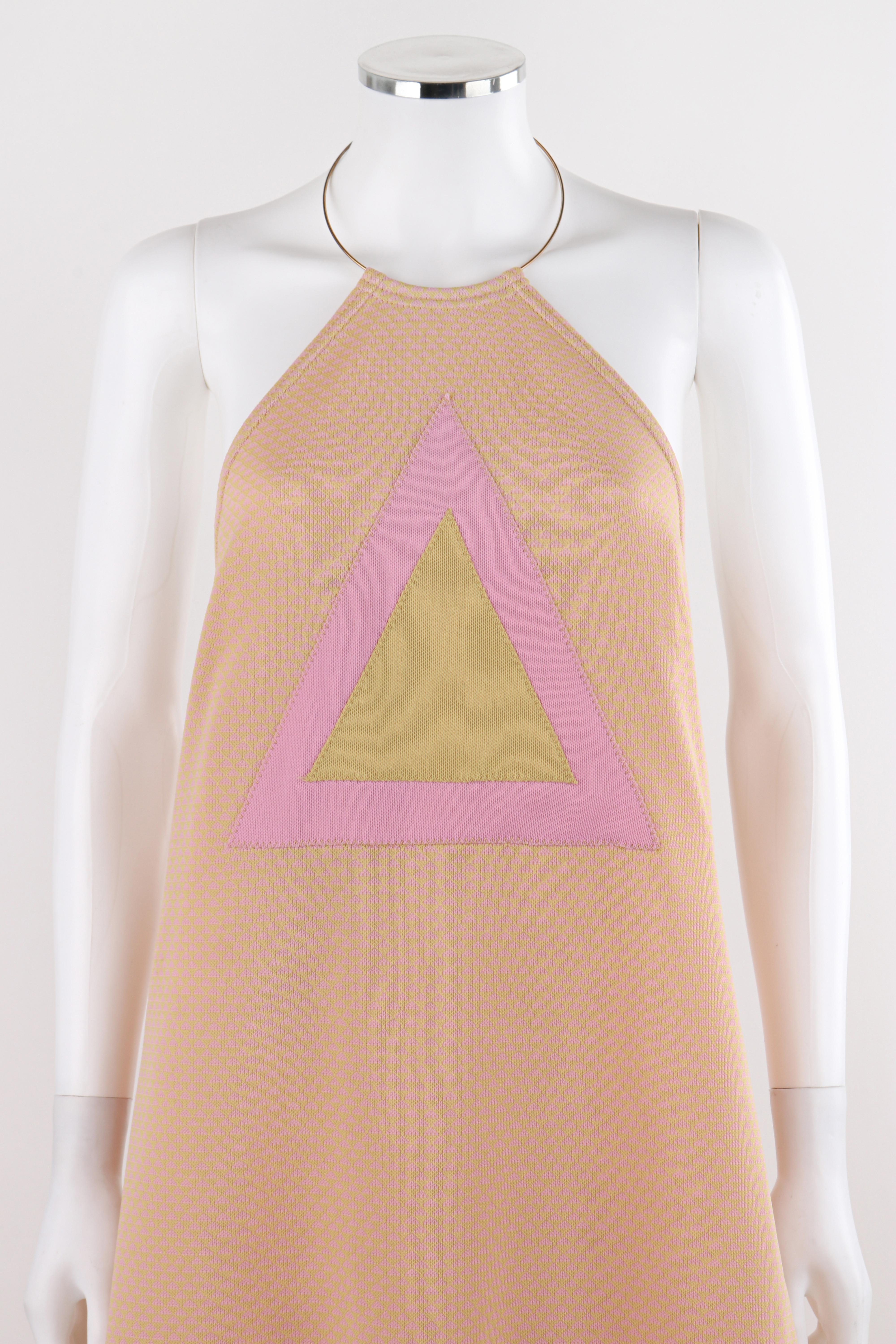 RUDI GERNREICH c.1970 Pink Yellow Triangle Knit Choker Necklace  Halter Top Dress - New Old Stock

Circa: 1970
Label(s): Rudi Gernreich Design for Harmon Knitwear
Designer: Rudi Cernreich
Style: Halter tent dress; metal necklace top
Color(s): Pink
