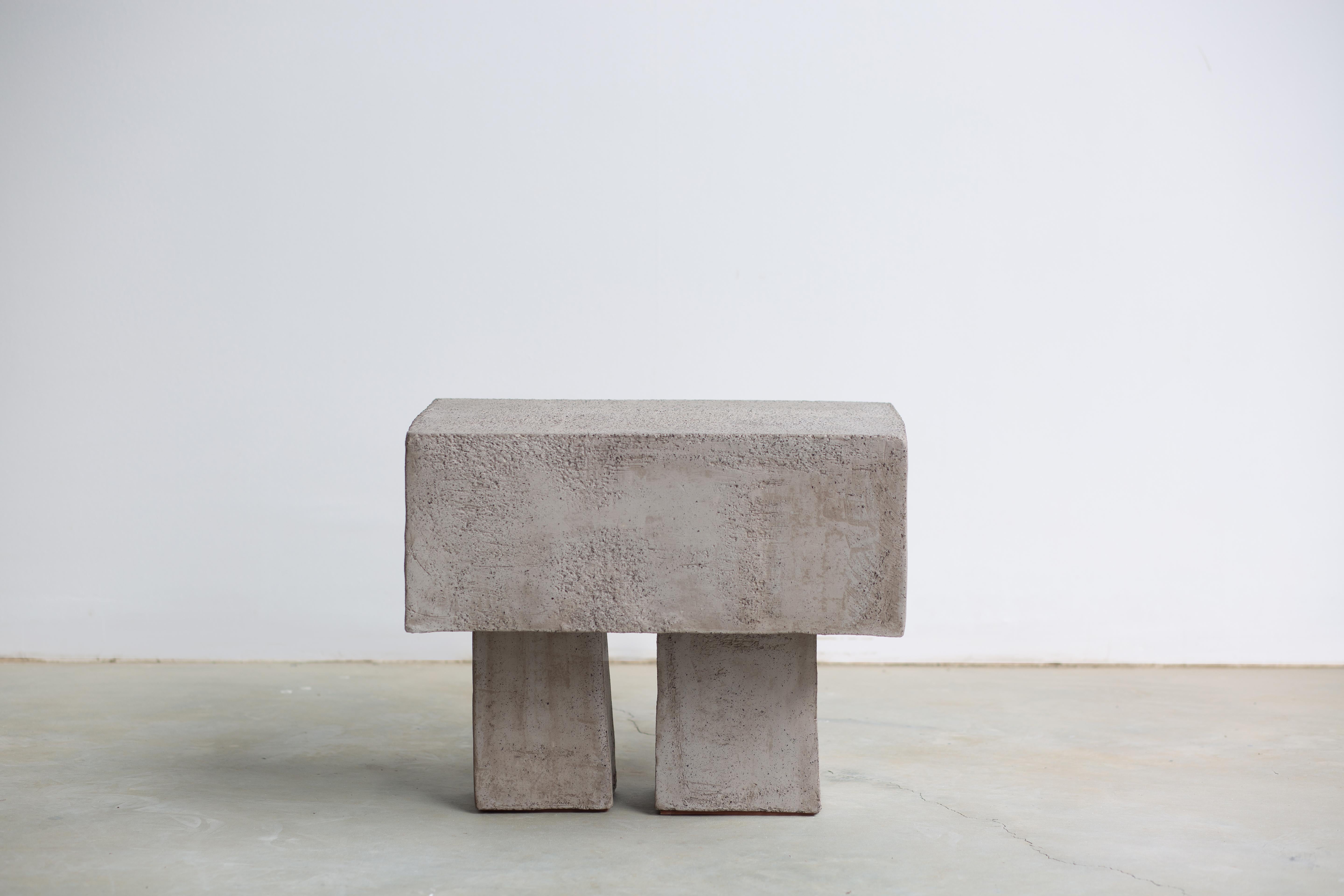 Rudis Stool by Isin Sezgi Avci
Unique Piece.
Dimensions: D 35 x W 50 x H 43 cm.
Materials: Hand-built ceramic.

The Rudis stool is a piece of ceramic furniture. The clay material is used to its limits to create a sculptural expression with the