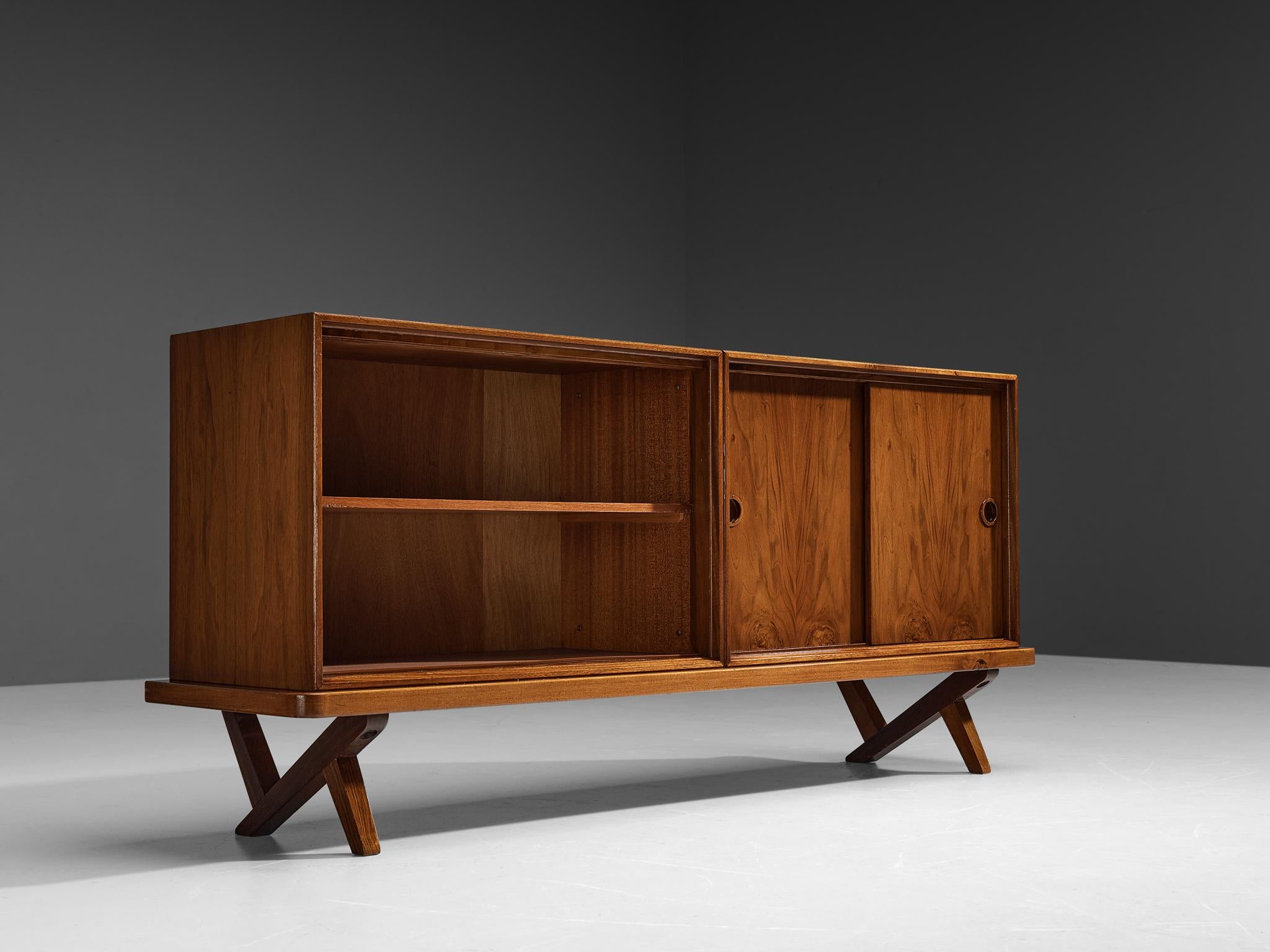 Rudolf Bernd Glatzel for Fristho, sideboard, walnut, The Netherlands, 1955.

This beautifully designed piece by Rudolf Bernd Glatzel for Fristho holds incredibly high qualities that are discernible in the construction. The whole corpus is executed