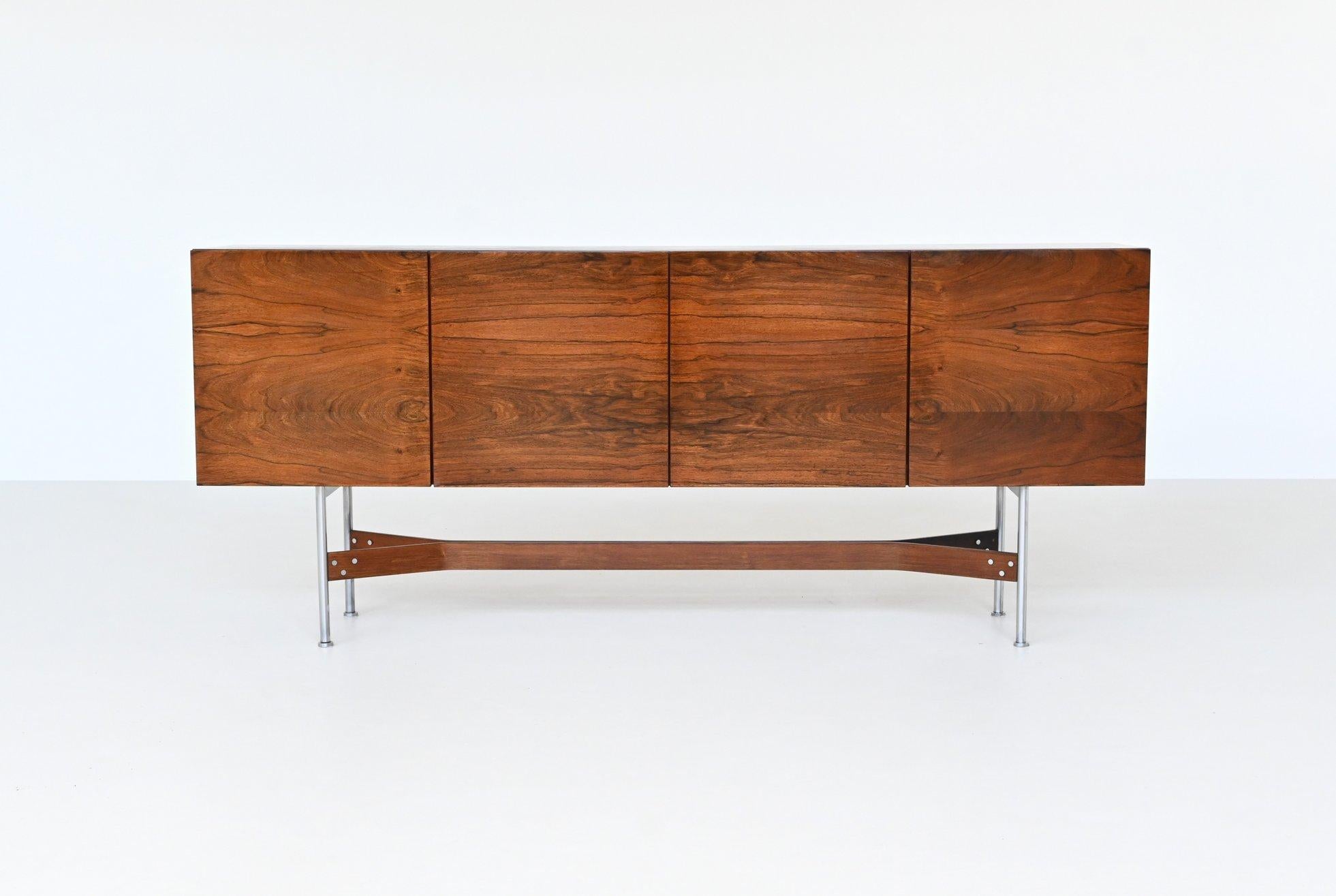 Stunning and very well crafted sideboard model GLR-230 designed by Rudolf Bernd Glatzel and manufactured by Fristho Franeker, The Netherlands 1962. The elegant tubular frame of brushed steel connected with a ply rosewood cross contribute to the