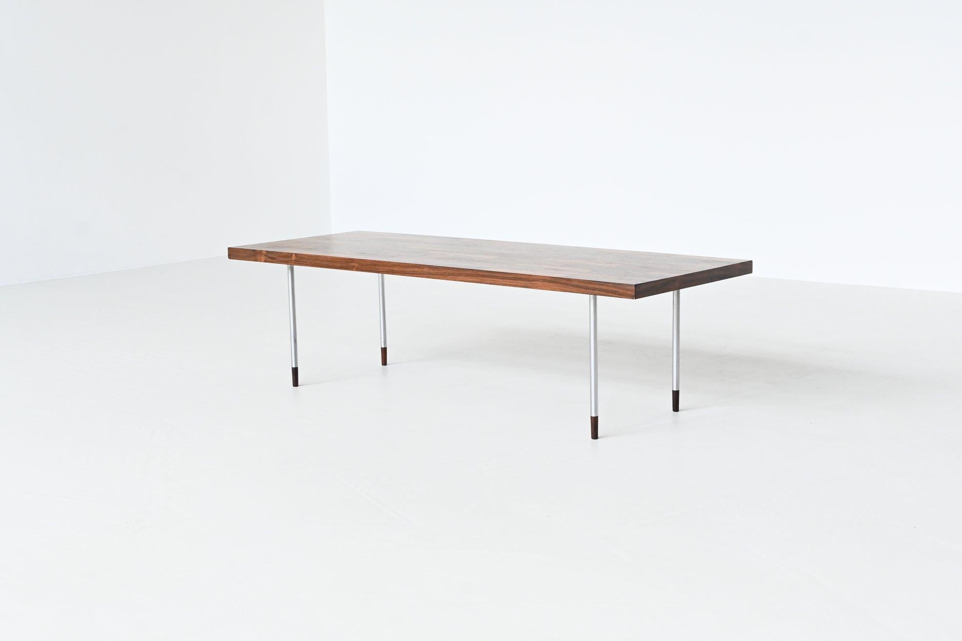 Beautiful sleek and minimalistic coffee table designed by Rudolf Bernd Glatzel for Fristho Franeker, The Netherlands 1960. The table has a rectangular top which is made rosewood veneered slats in wonderful different tones. The warm expression of the