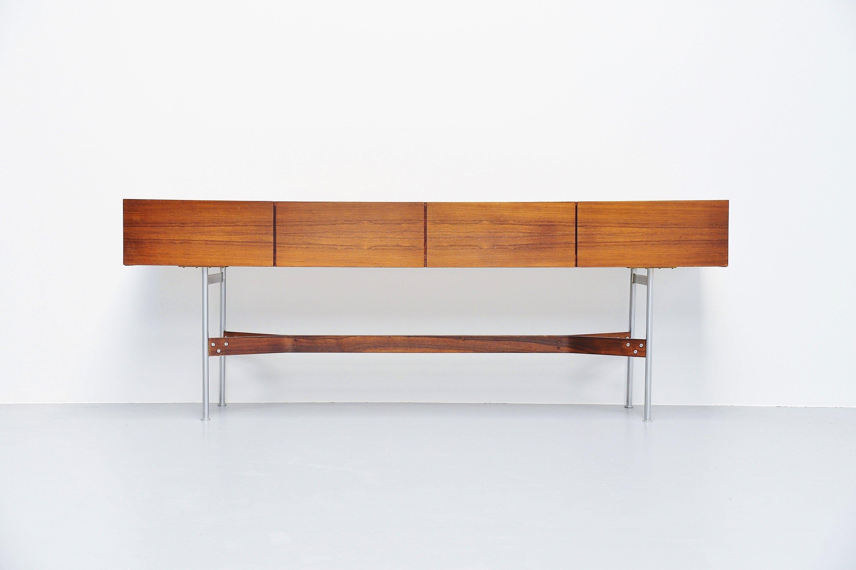 Highly sophisticated and unique custom made sideboard model GLR-230 designed by Rudolf Bernd Glatzel and manufactured by Fristho Franeker, Holland, 1962. This super refined completely finished double sided sideboard is made of nicely warm grained
