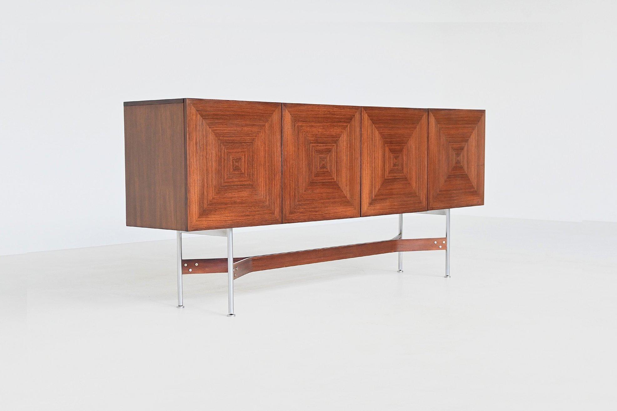 An exceptionally rare and visually striking sideboard designed by Rudolf Bernd Glatzel for Fristho Franeker, Netherlands, 1962. Model GLR-230 is a masterpiece of mid-century modern design, blending architectural precision with rich materiality.

The