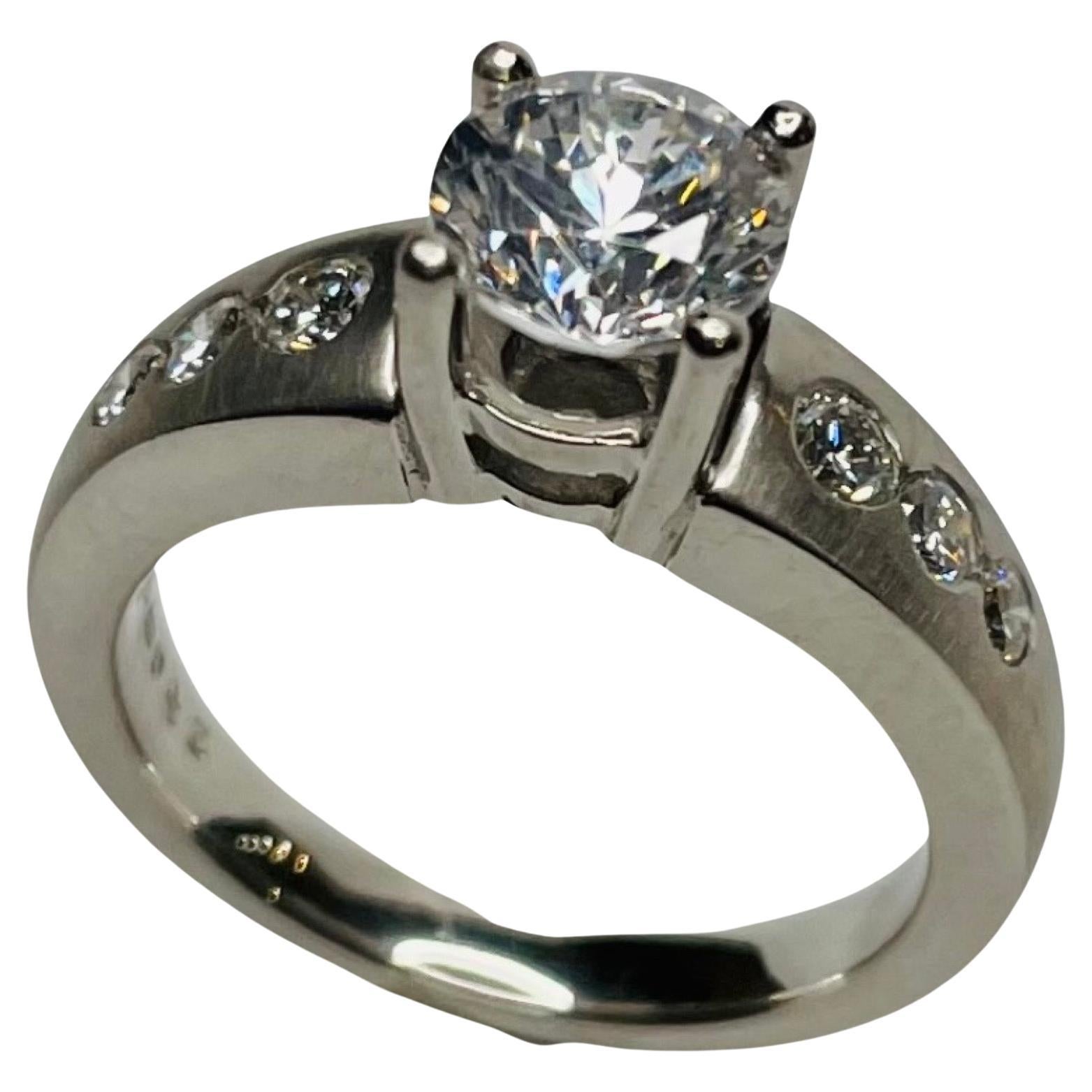 Rudolf Erdel Platinum Engagement Ring with Side Diamonds For Sale