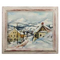 Rudolf Jacobi (tedesco, 1889 - 1972) Un villaggio innevato, olio su tela.
