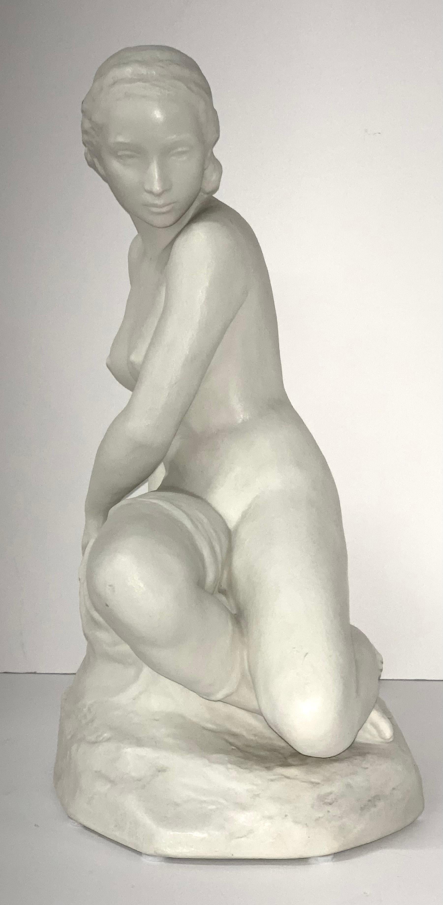A nice porcelain or parian type figurine of a nude female by Rudolf Kaesbach for Rosenthal. In very good condition signed on the base and marked Rosenthal on the bottom. It is 12 inches tall and approximately 8 inches wide and 6 inches deep.
    