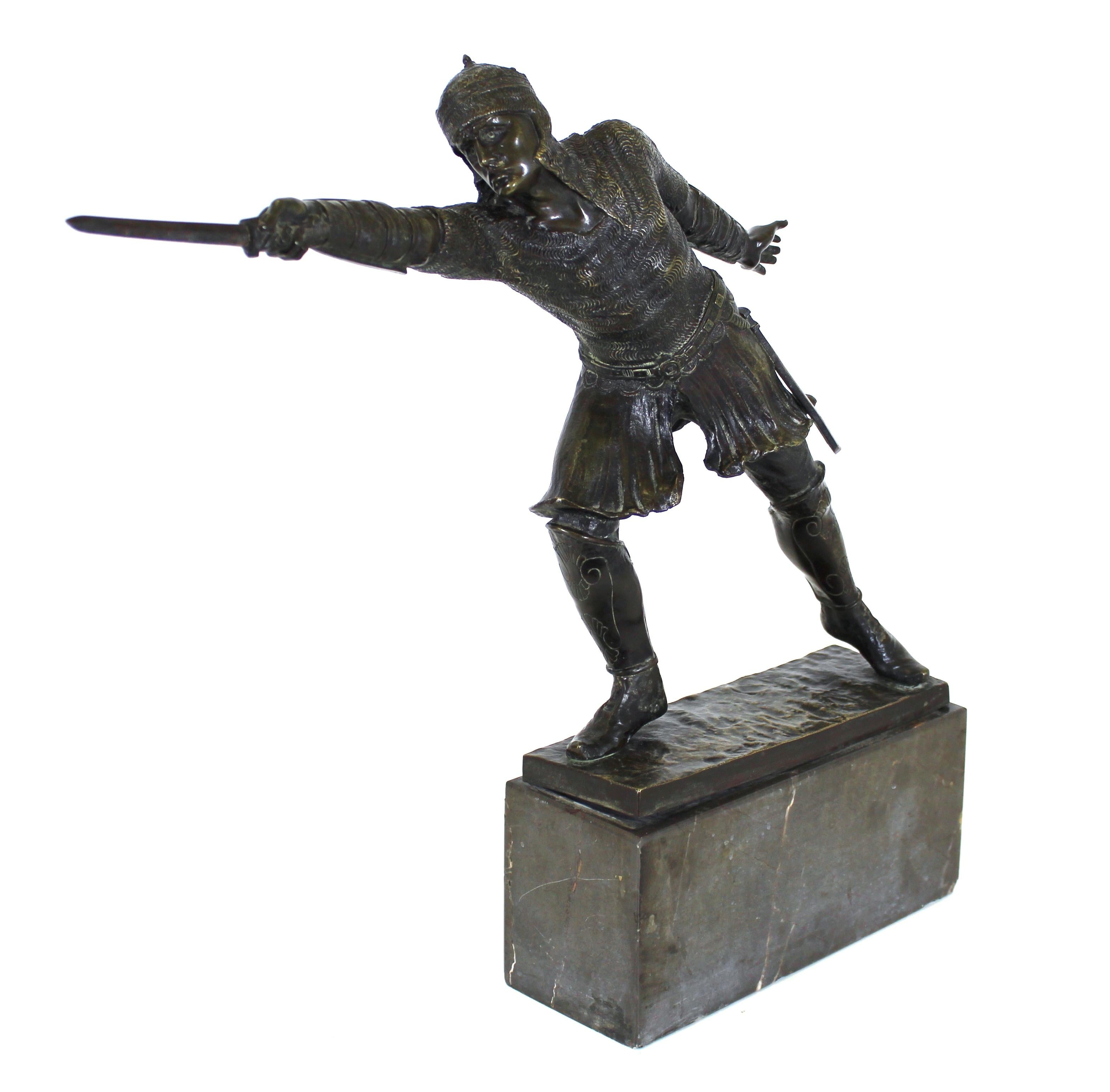 Rudolf Kuchler Austrian Medieval Revival bronze sculpture of a charging Teutonic knight, mounted on a marble base. Foundry mark on the back of the bronze base. Kuchler was a renown artist who worked in Berlin in the 1880s.
Minor chips to the