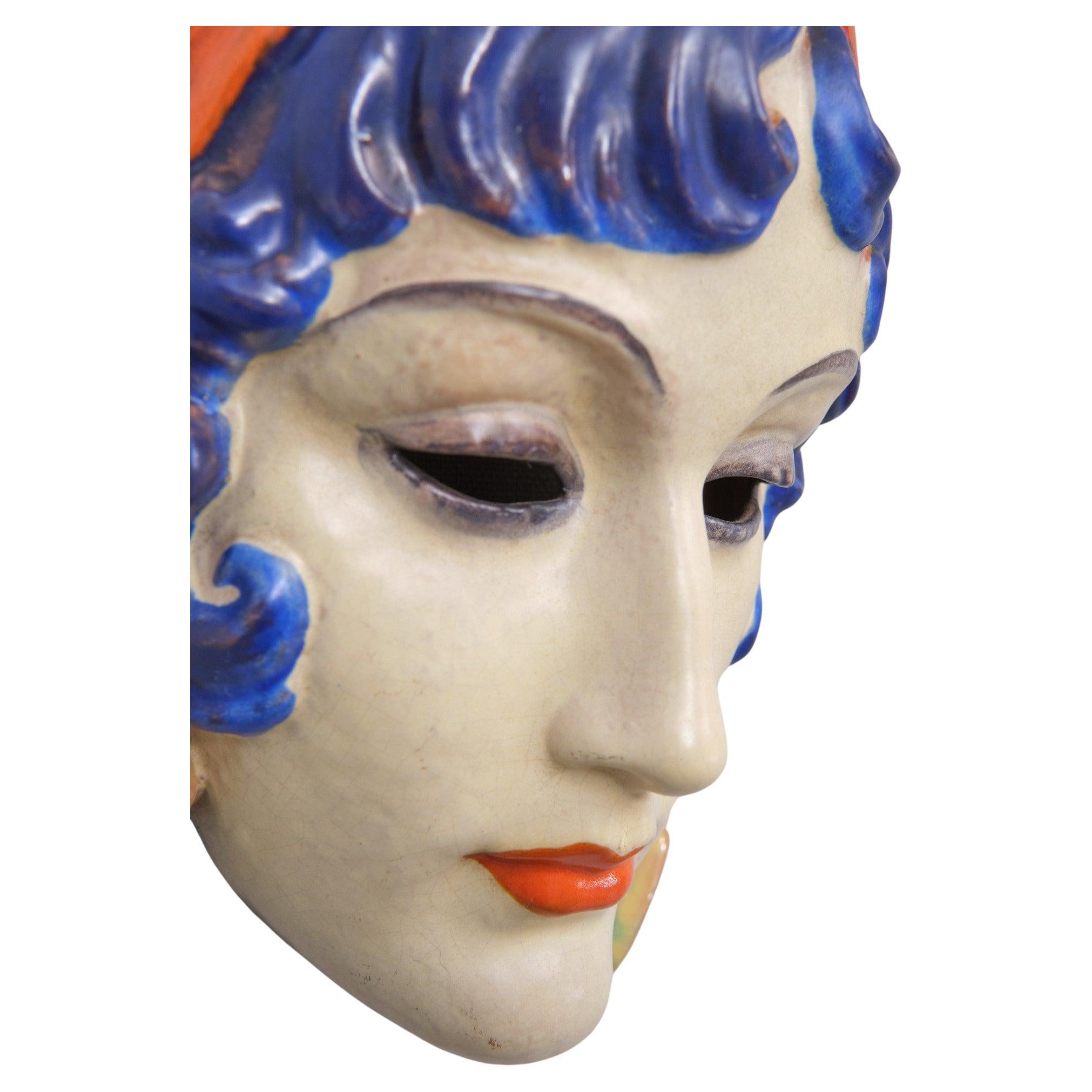 Beautiful serene mask of a Art Deco women  Rudolf Podany for Keramos - polychrome earthenware wall mask. 1930s   signed .
Very good condition . 