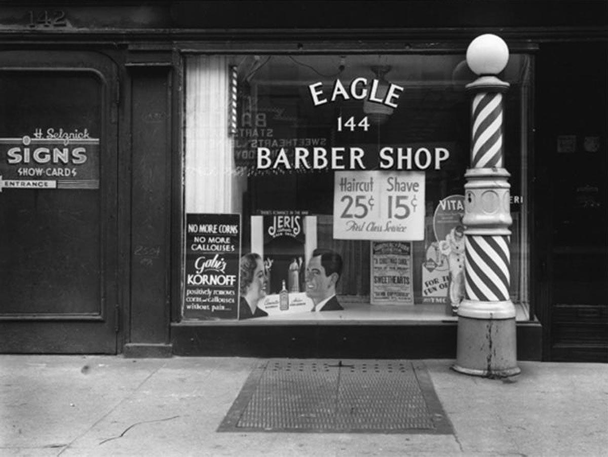 Rudy Burckhardt Black and White Photograph - New York, 1940 [Barber Shop Window]