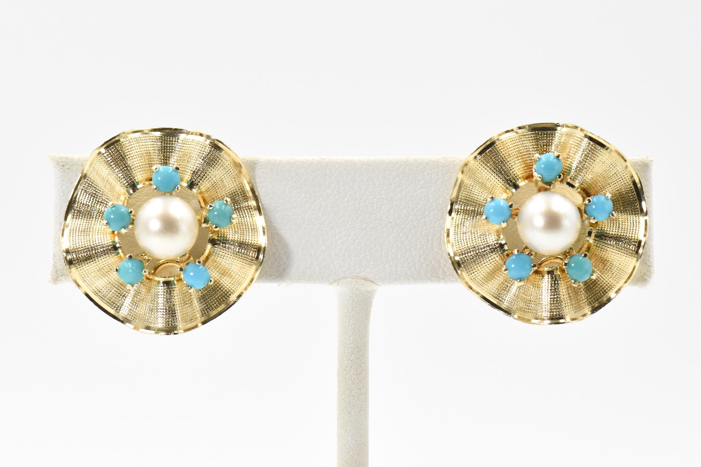 Classic elegant three dimensional flower earrings featuring a centrally set 6.8 mm cultured pearl set between 5 prong set turquoise beads.  The outer gold frame is rubbled and has a textured finish with a shiny edge.  The earrings are 14k yellow