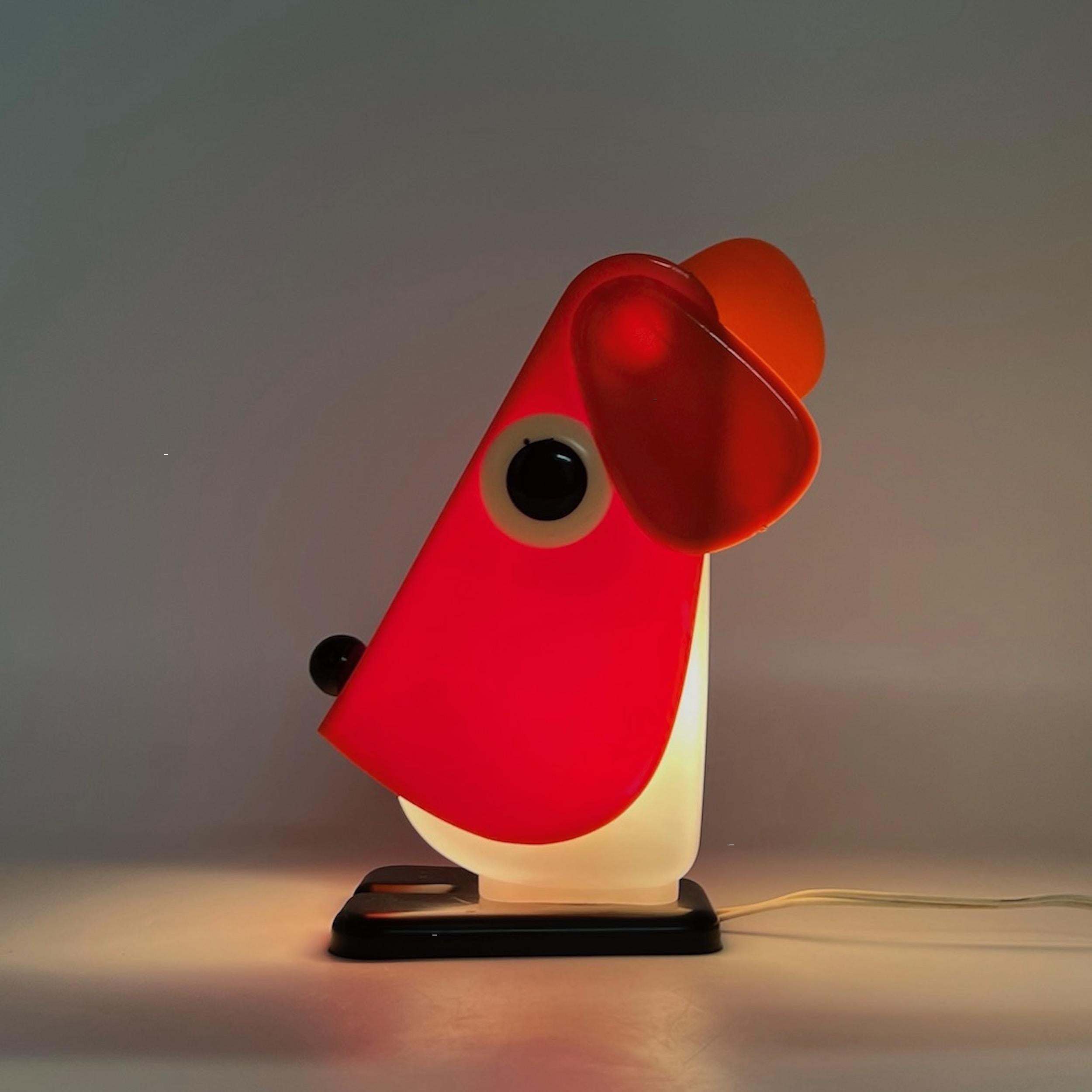 Hyper-rare and iconic ‘Rufus’ lamp designed by Fernando Cassetta in the early 70s for Tacman Manara.

This legendary model with a charming and cute dog design oozes 70s creativity and flair. Like other iconic design lamps it will not only provide a