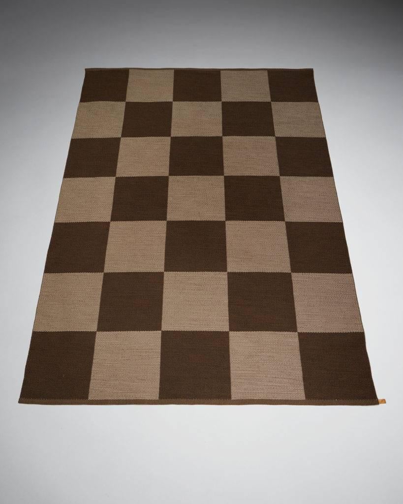 Rug “Arkad Checkerboard” designed by Gunilla Lagerhem-Ullberg for Kasthall,
Sweden, 1980s.

Wool.

Measurements: 
L: 300 cm/ 9' 10 1/2''
W: 200 cm/ 6' 7 1/4''