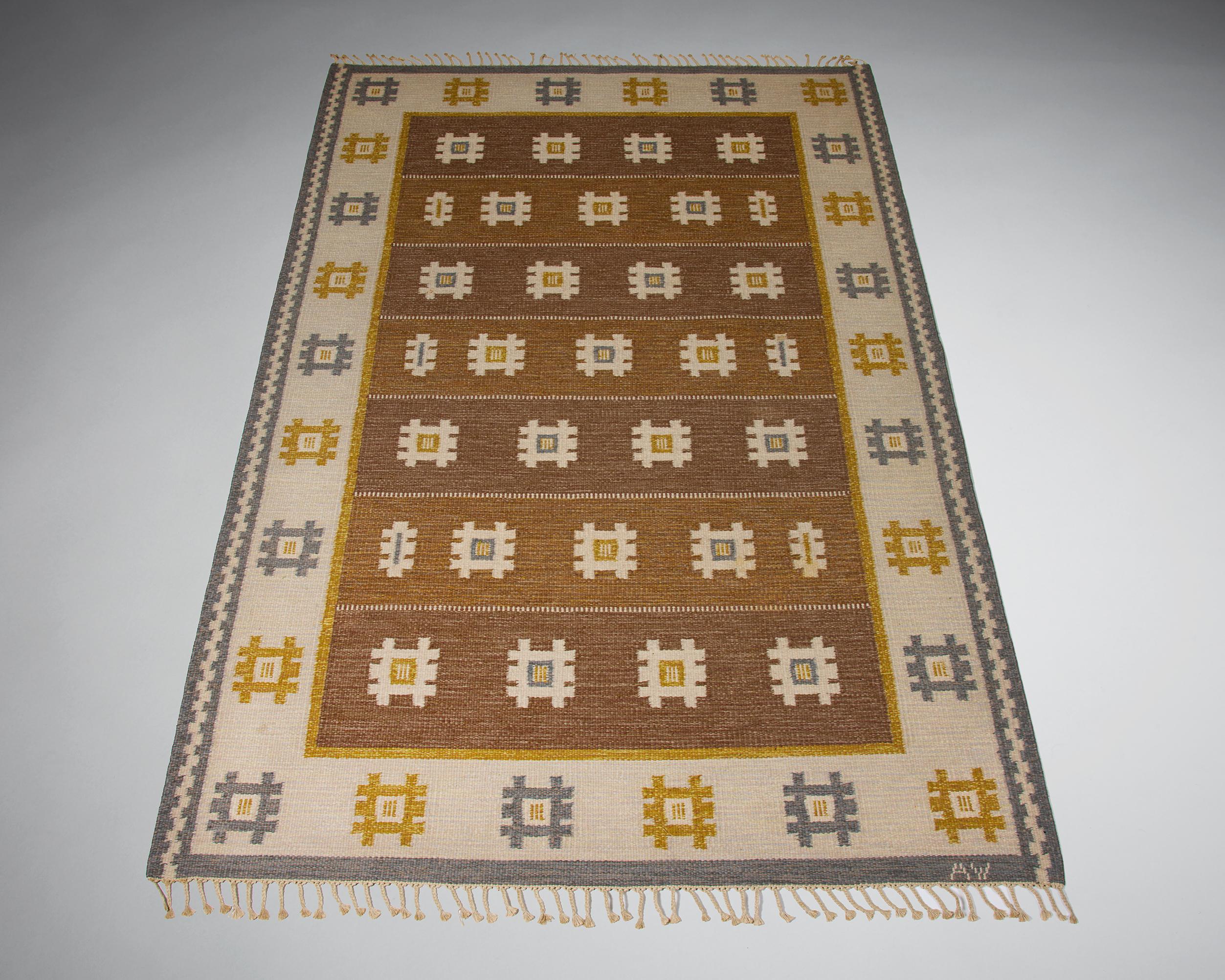 Rug by Alice Wallebäck, Sweden, 1950s.

Wool.

L: 200 cm / 6' 6 3/4
