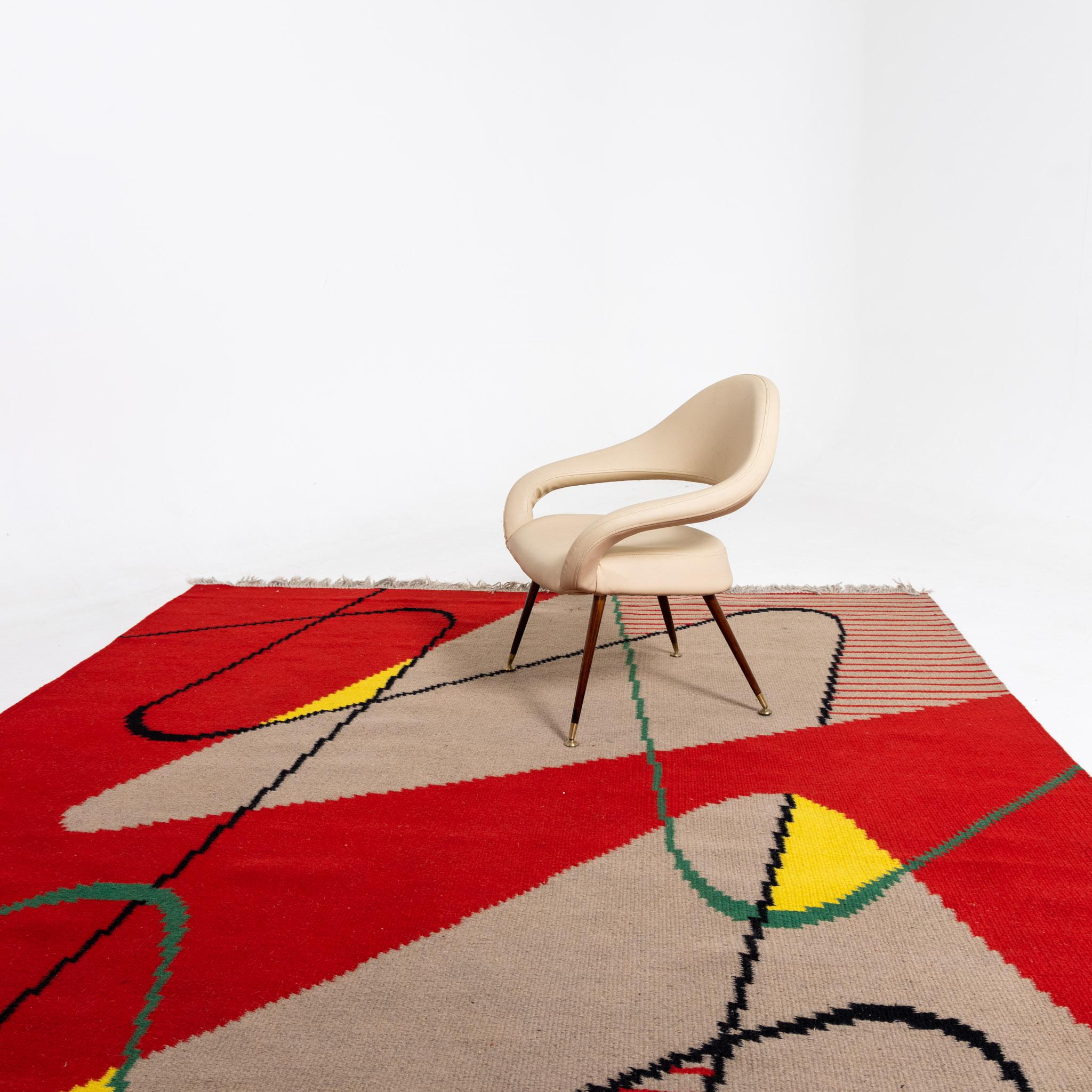 Geometric patterned wool rug in red, beige and yellow with green and black lines designed by Antonin Kybal in the 1950s.