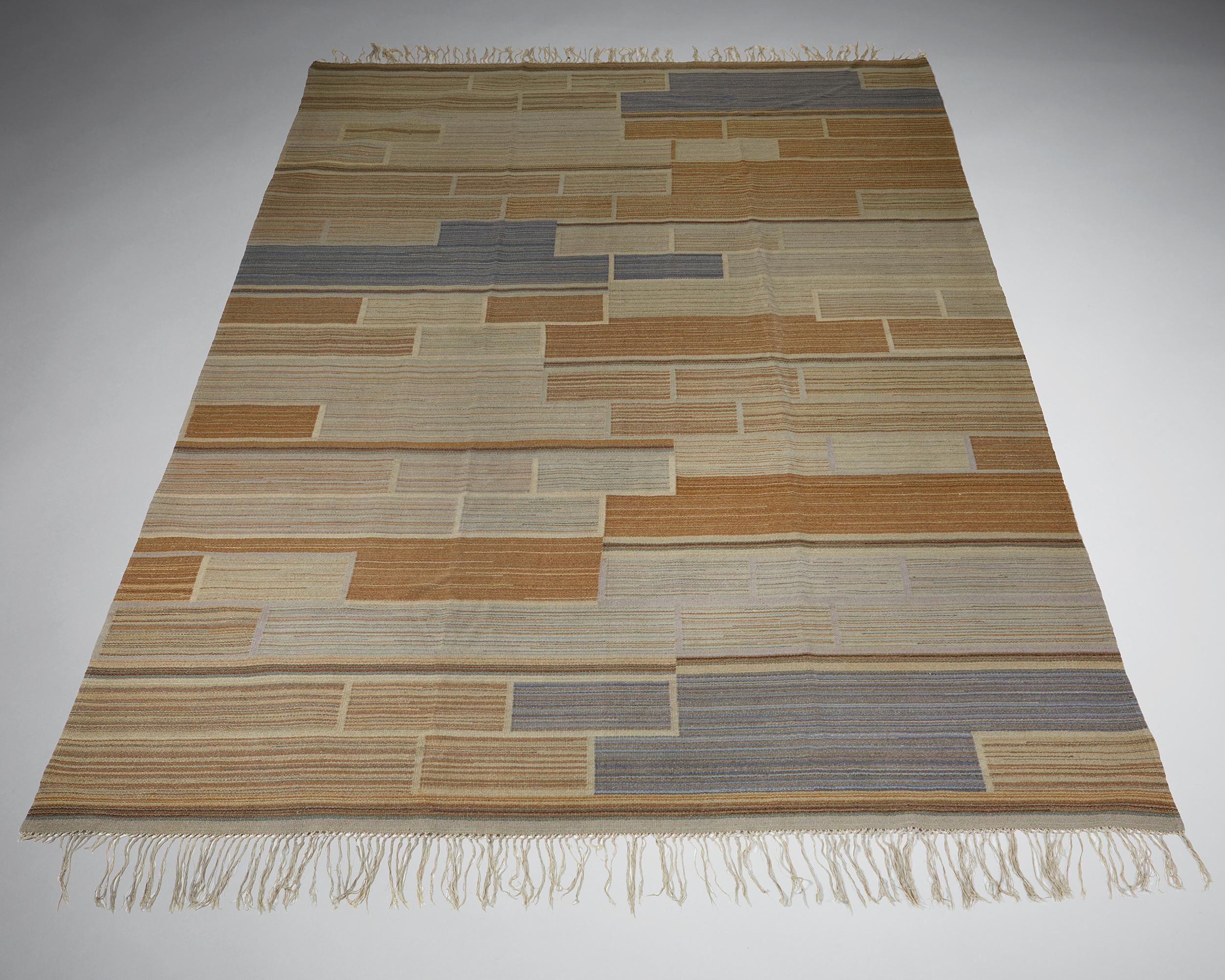 Rug designed by Greta Skogster-Lehtinen for Aaltosen Mattokutomo,
Finland, 1930s.

Flat weave.

Crafted in Finland by Aaltosen Mattokutomo in the 1930’s, Greta Skogster-Lehtinen designed this for the office of the Chancellor of the Finnish