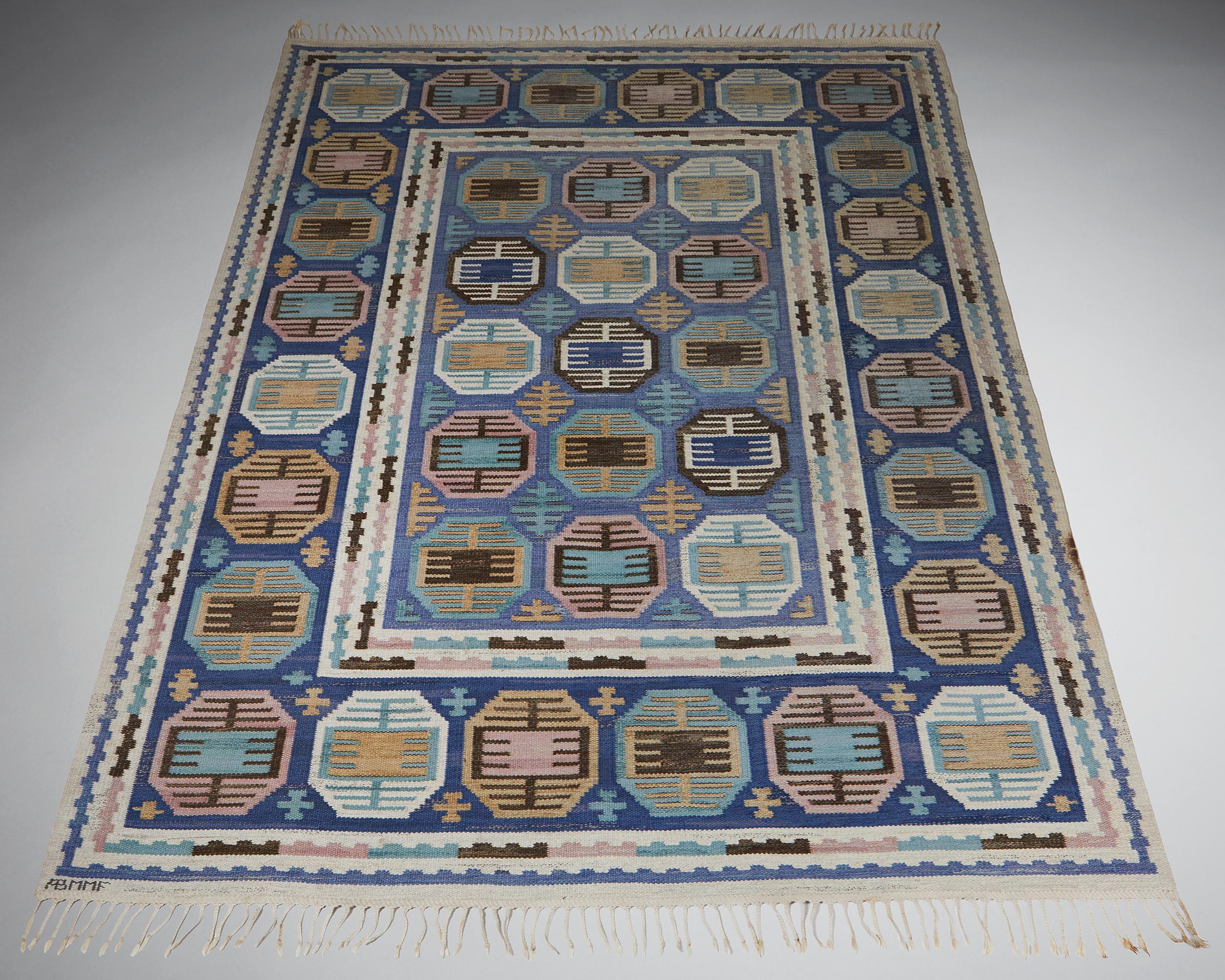 Woven after 1941. Wool. 

Signed ’AB MMF’

Measurements: 
L: 322 cm / 10’ 6 3/4