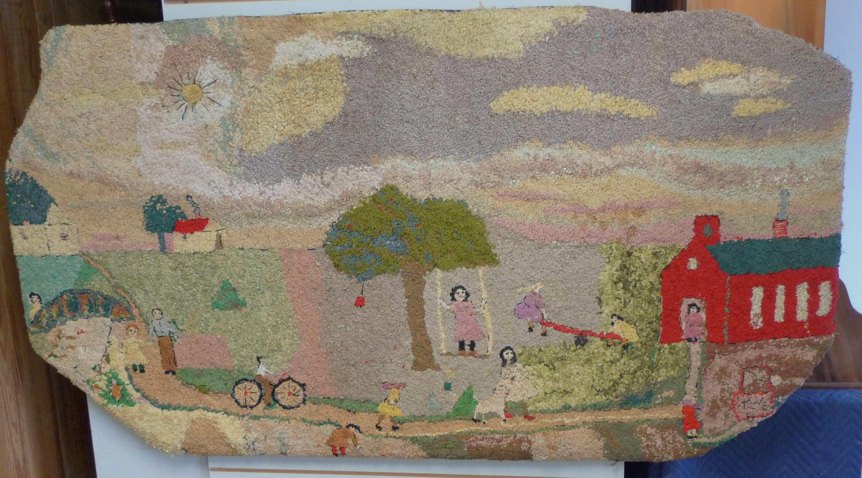 Folk Art rug of hand-hooked wool yarns depicts the morning arrival at a country schoolhouse. The earthen colors give way to bold, childlike playfulness, the sun shines bright, and the scene is bucolic at its best. Note the freeform edges to the