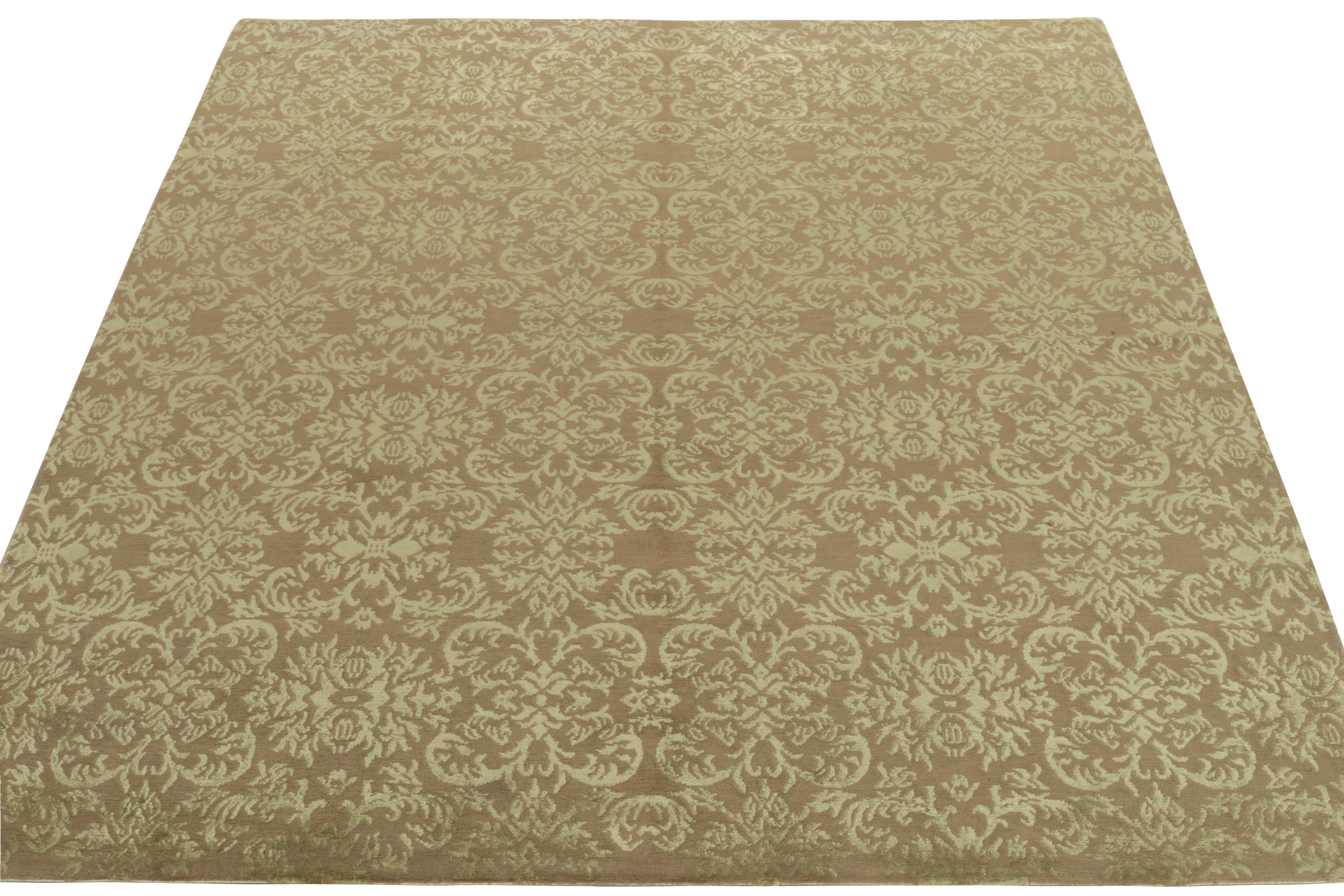 From Rug & Kilim’s European selections, an almost square piece reading classic floral variations in fine transitional style. The hand-knotted rug dons a lustrous appeal from the natural sheen of wool & silk blend further complementing subtle