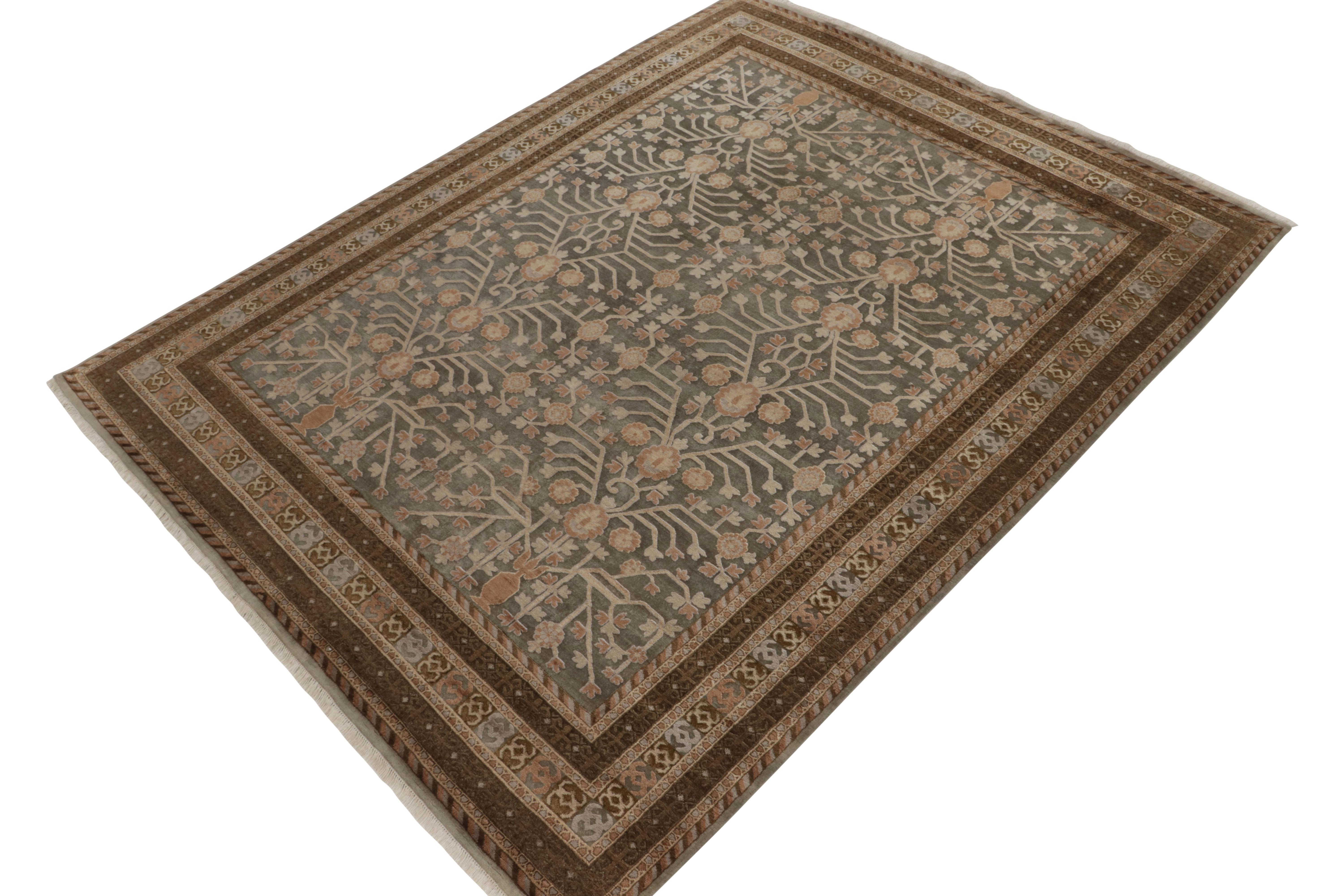 Hand-knotted in wool & silk, this 9x12 from our Modern Classics collection is an ode to antique Khotan-Samarkand rug styles. 

On the Design: The piece enjoys gracious scale and intriguing grayish blue and beige-brown depictions of an archaic