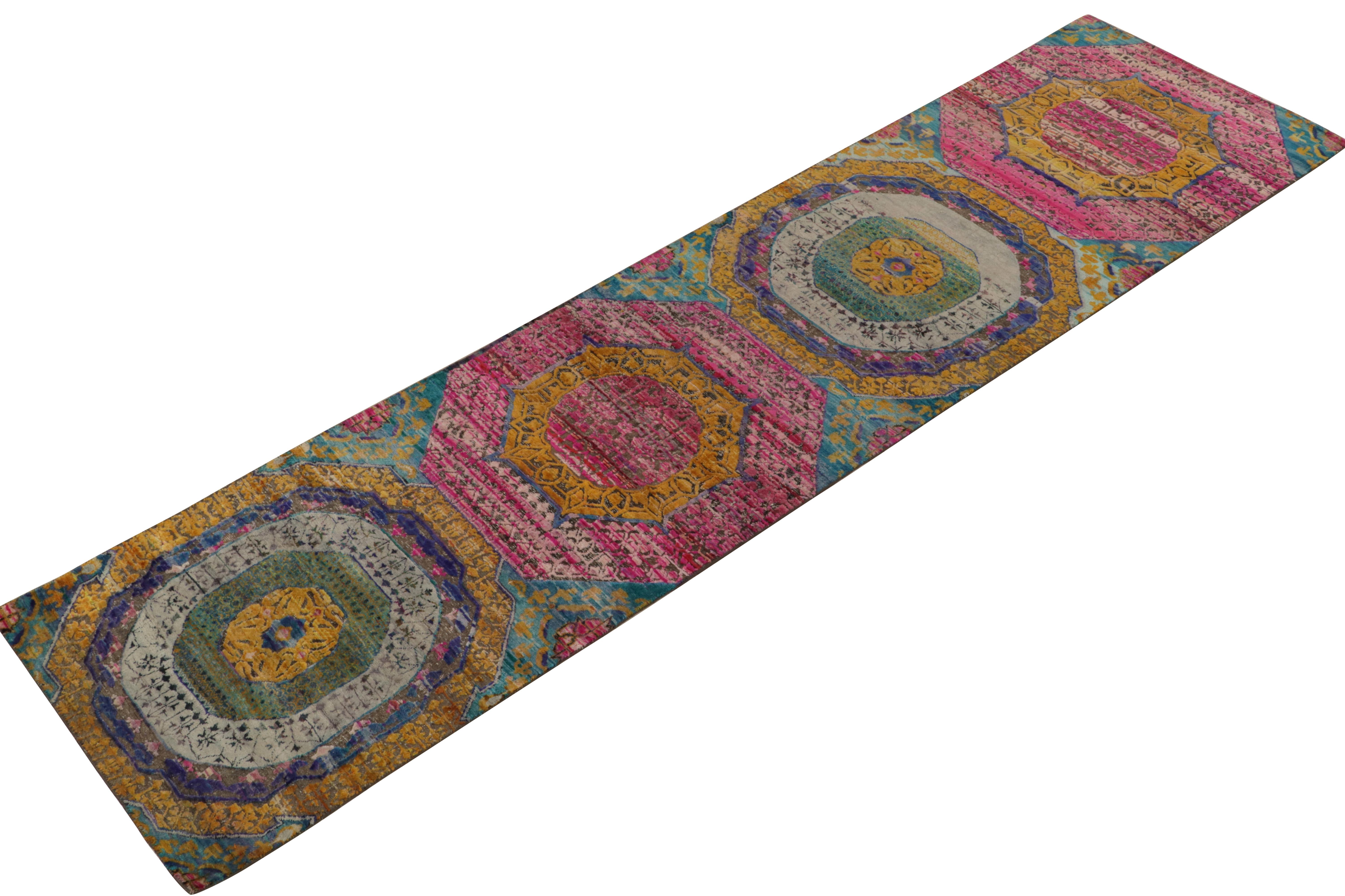 Hand knotted in fine quality wool & silk, a gorgeous 3x11 runner inspired by 17th century Indian designs.

New to our Modern Classics collection, the design depicts an elaborate Classic design in indigo, blue, gold, pink and green addressing the