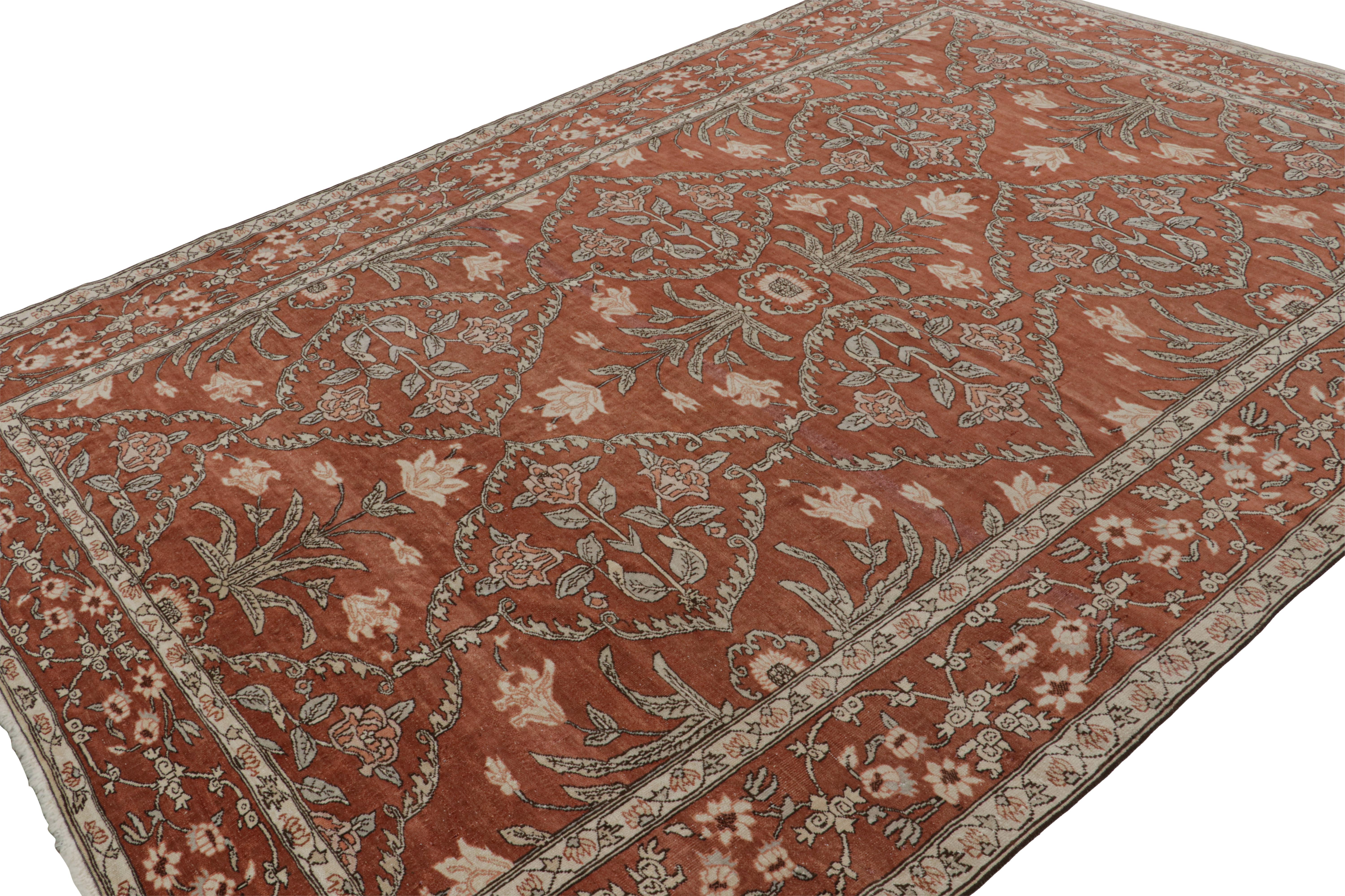 Hand-knotted in wool, this 8x11 17th century Antique Mogul rug has a red field with notes of pink, brick, salmon, or even corral red. This masterpiece sheds light on a design believed to have been made for the court of Emperor Shah Jahan.  

On the