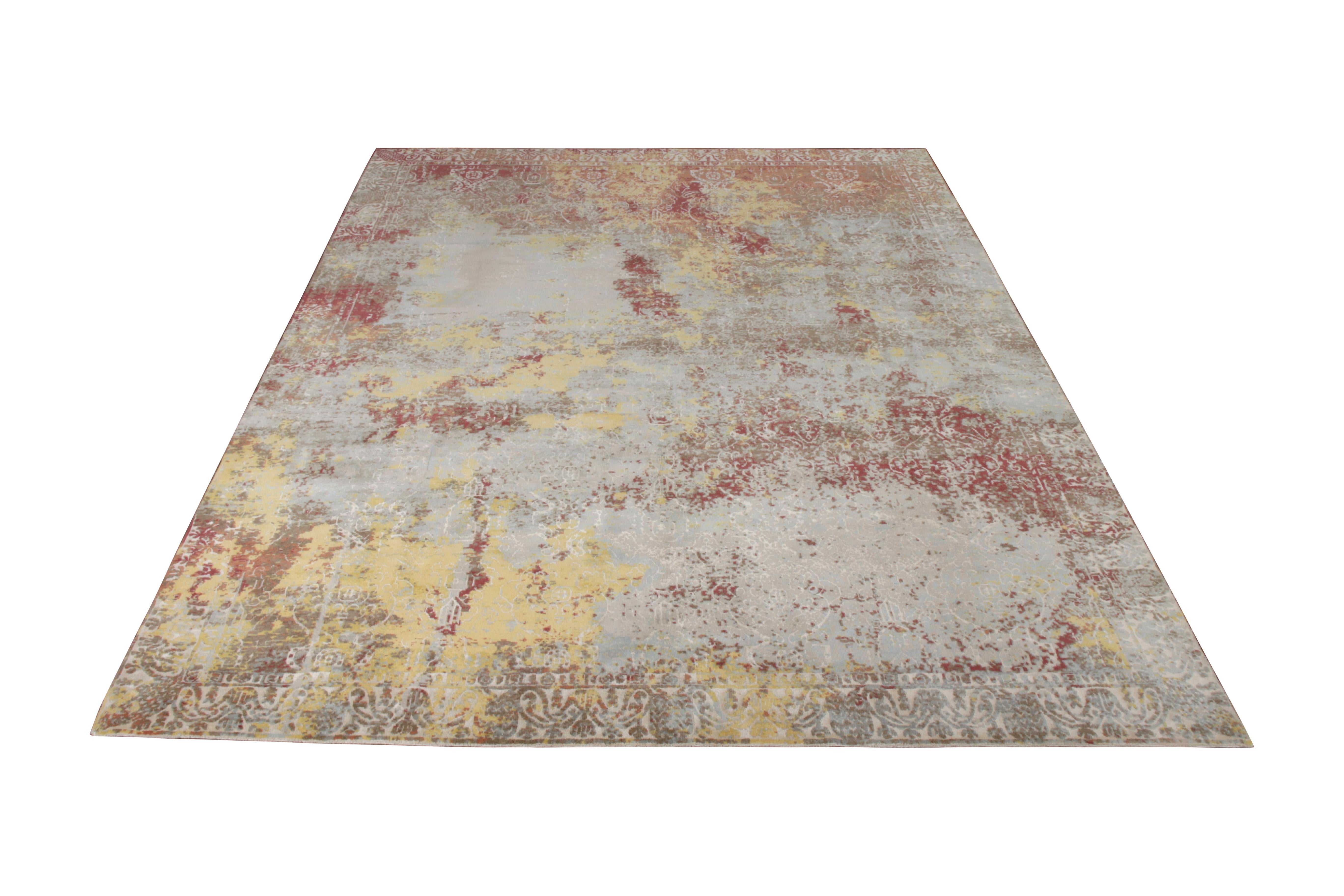 This 9×12 abstract rug is a bold new addition to Rug & Kilim’s Modern rug collection.

Hand-knotted in wool and silk, it enjoys a movement like watercolors in dominant reds and blues with gold accents therein. The silk’s natural sheen further lends