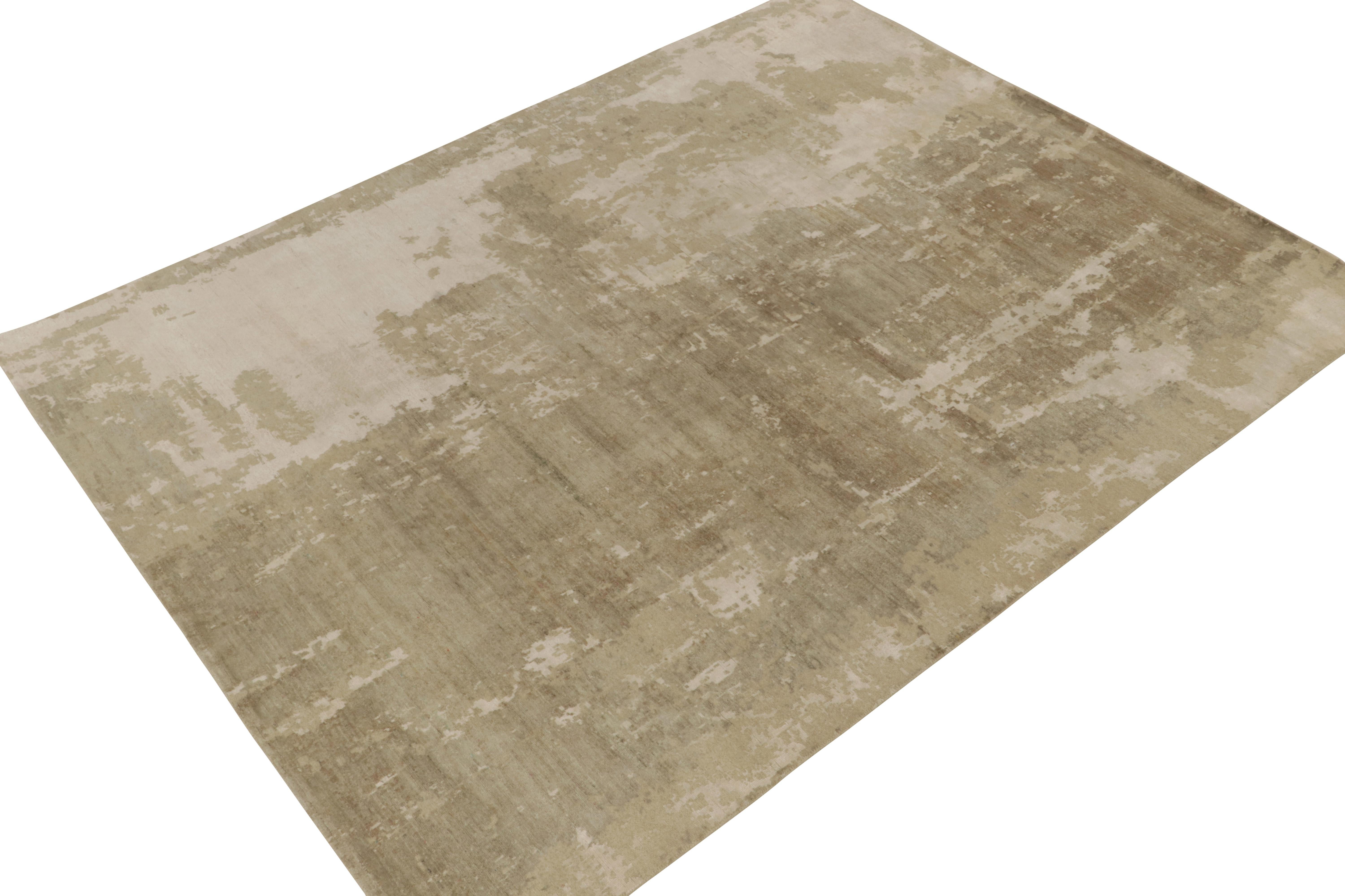 From Rug & Kilim’s bold modern selections, an 8x10 abstract rug graciously hand-knotted in fine wool & silk. 

On the Design: This contemporary design speaks to a comfortable, yet gently expressive pattern in beige-brown deliciously punctuated with