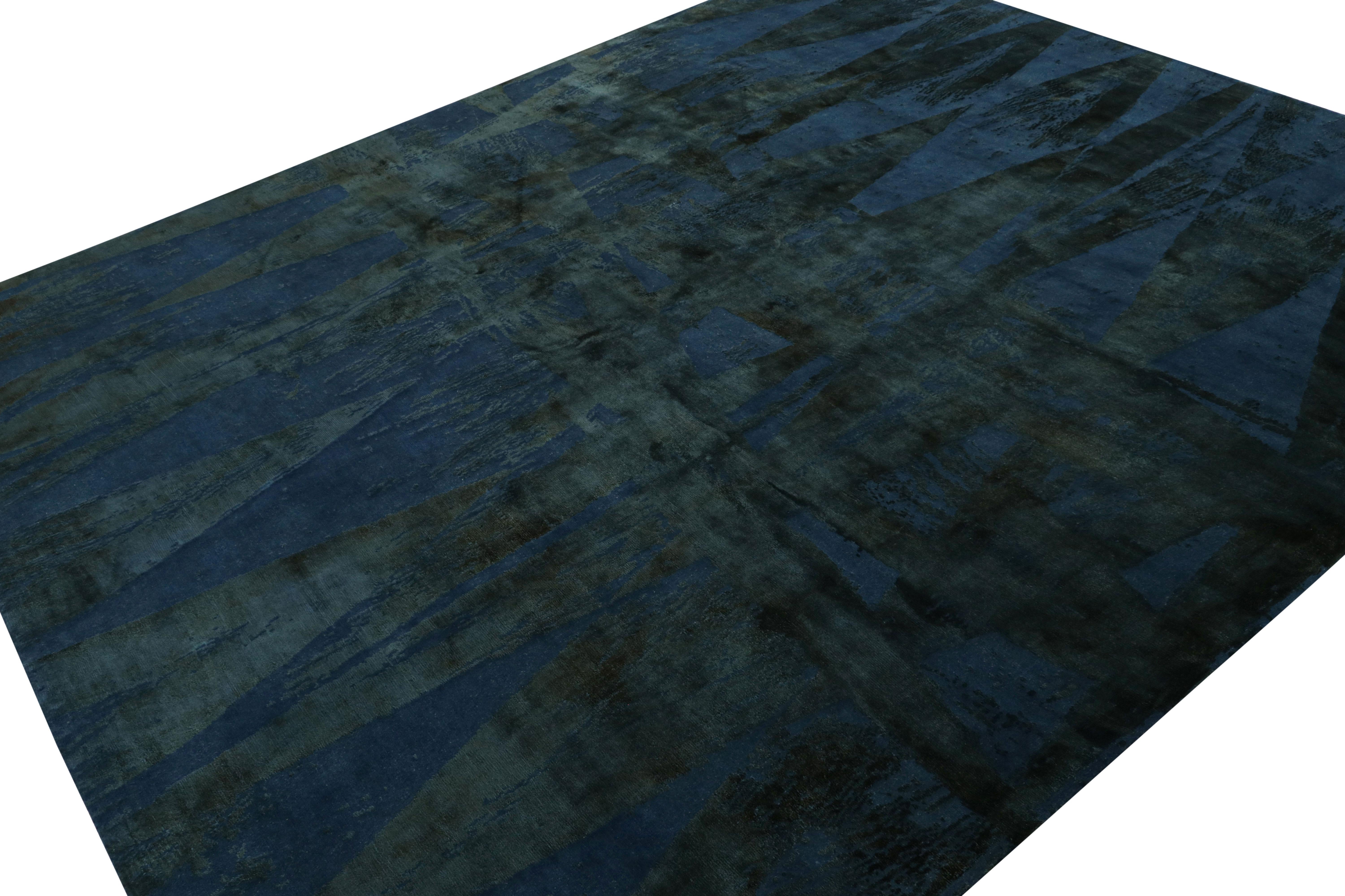 Dieser moderne Teppich im Format 9x12 ist aus Wolle und Seide handgeknüpft und zeichnet sich durch tiefe und stimmungsvolle Blautöne aus, die eine subtile Reihe abstrakter geometrischer Muster bilden.  

Über das Design:

Mit der Langlebigkeit eines