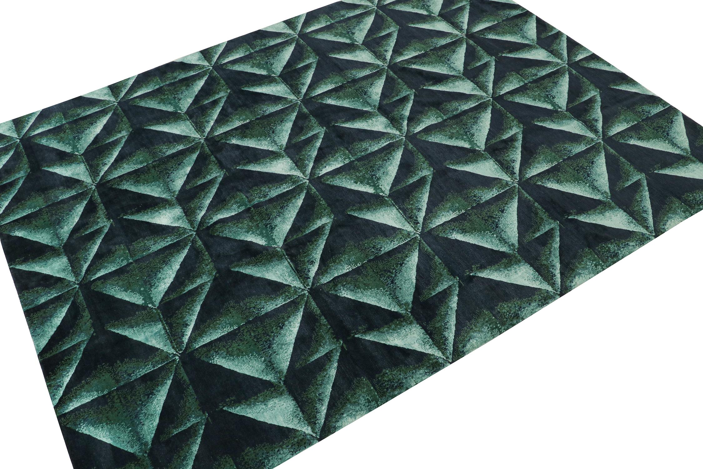 This 9x12 abstract rug is the next addition to Rug & Kilim’s bold modern rug designs. Hand-knotted in wool and silk.

Further on the Design: 

This piece draws inspiration from origami designs, and hosts a unique geometric pattern in teal and