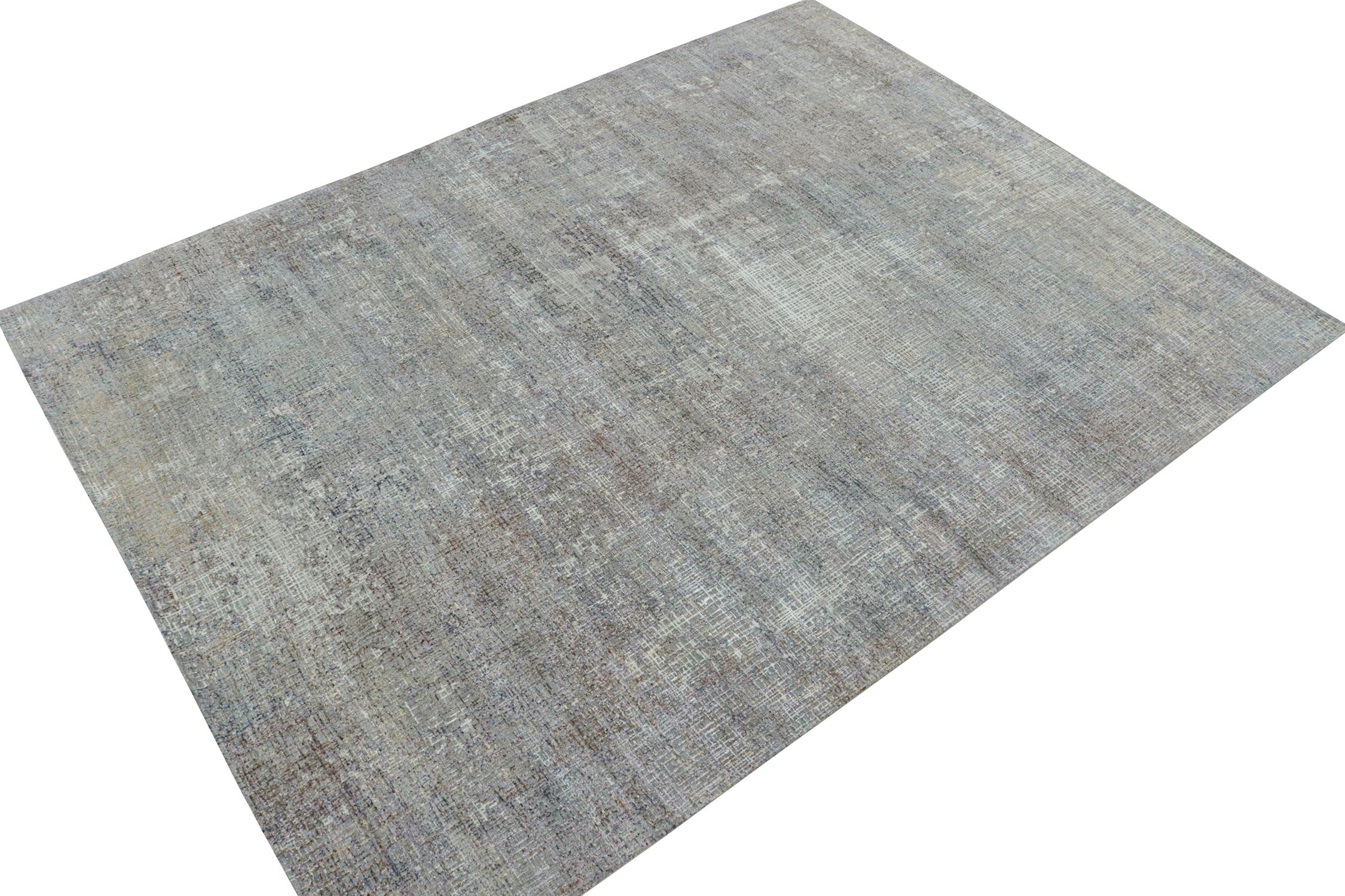 Dieser abstrakte Teppich im Format 9x12 ist eine neue Ergänzung zu den kühnen modernen Teppichdesigns von Rug & Kilim. Handgeknüpft aus Wolle und Seide.
Weiter zum Design: 
Dieses Muster zeichnet sich durch geometrische Streifen in Grau und bunte