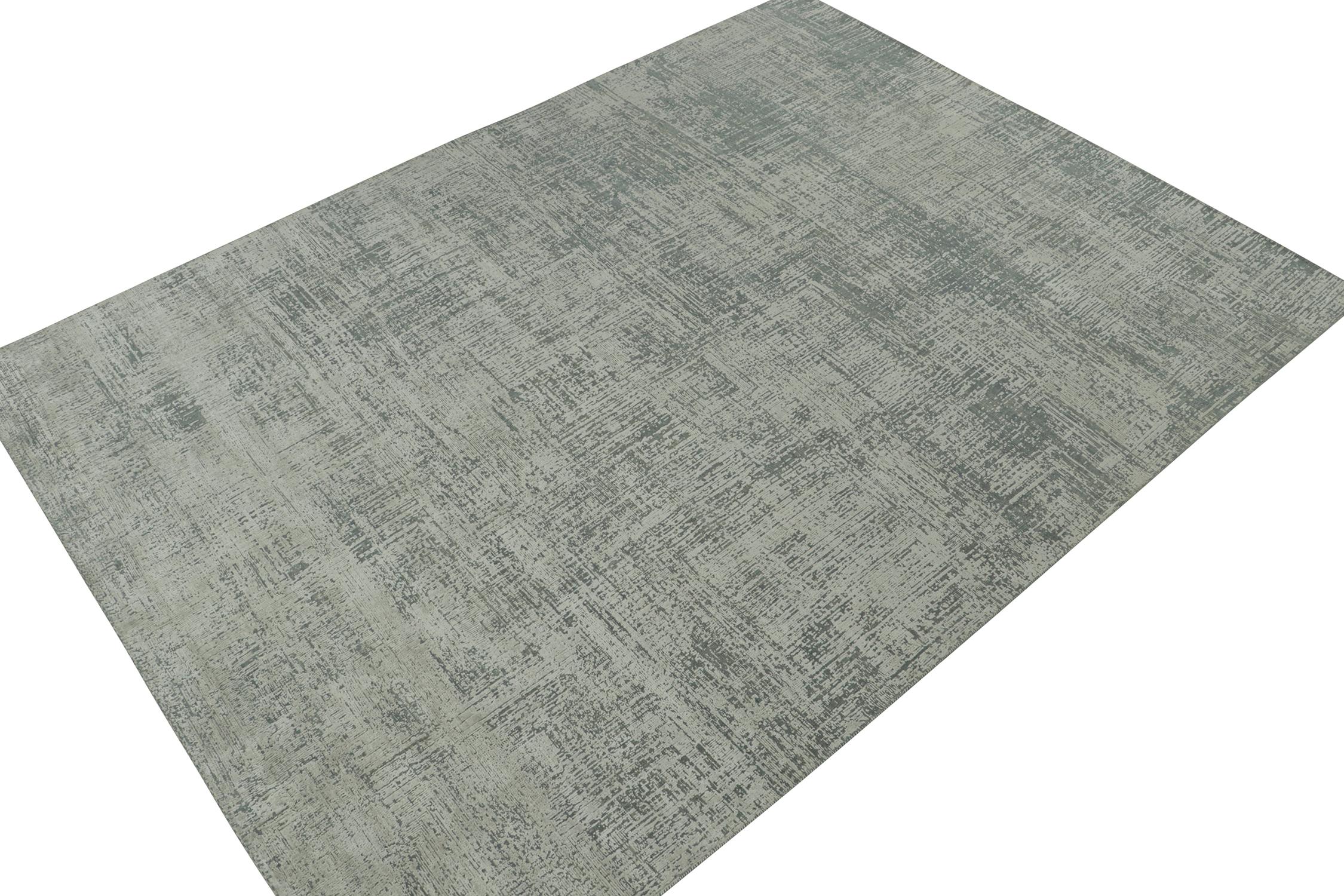 This 9x12 abstract rug is the next splendid addition to Rug & Kilim’s bold modern rug designs. Hand-knotted in wool and silk.
Further on the Design: 
This piece enjoys geometric streaks in gray and stone blue accents, and a gorgeous sense of