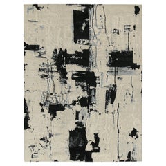 Rug & Kilim’s Abstract Rug in Ivory with Black and Ice Blue Patterns