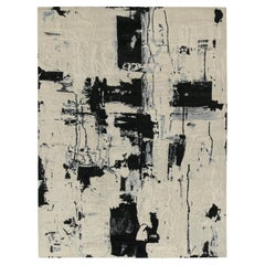 Tapis abstrait de Rug & Kilim en ivoire avec motifs noirs et bleu glacier