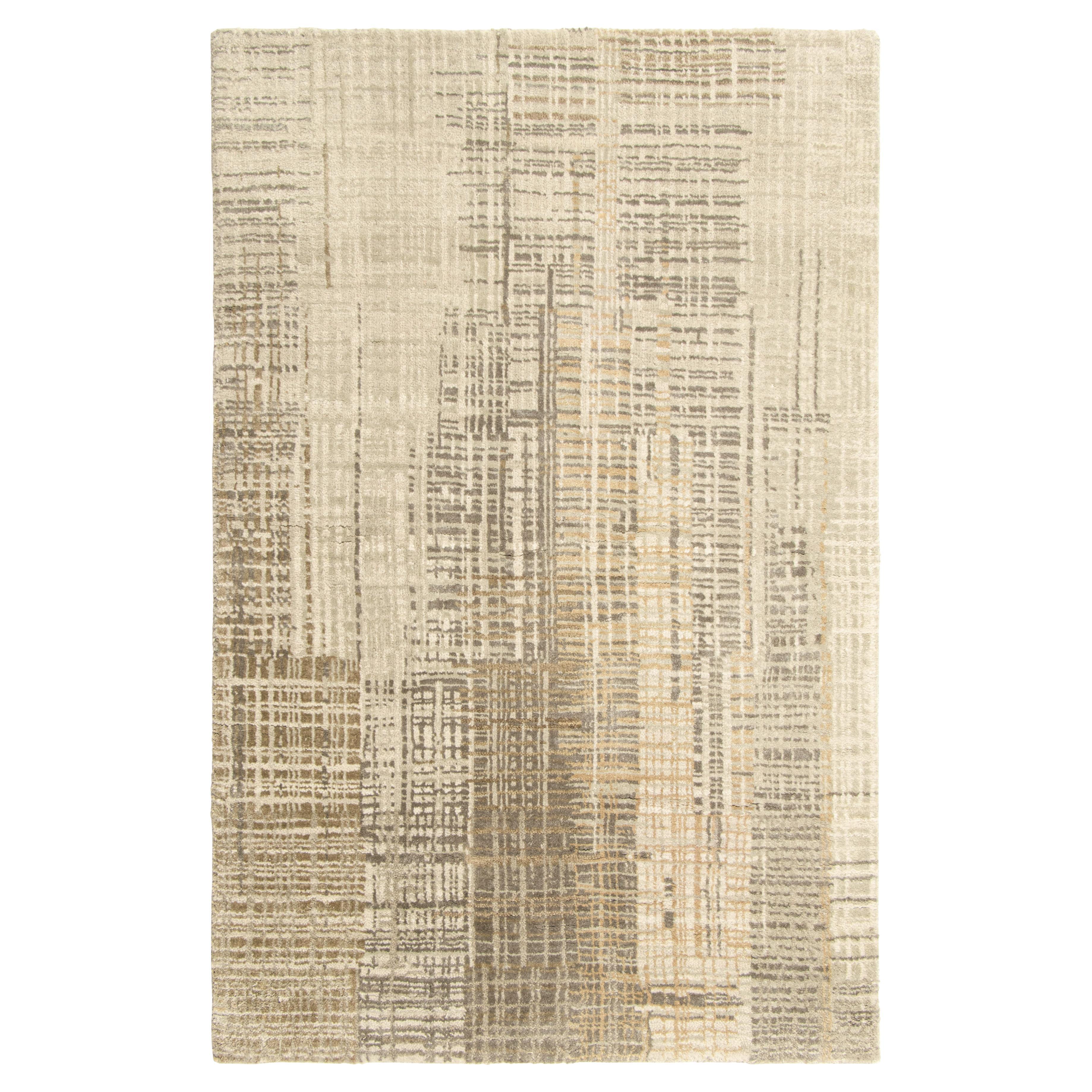 Rug & Kilim's Abstract Rug with Beige-Brown and Cream Striae & Geometric Pattern (tapis abstrait avec des rayures beige, marron et crème et un motif géométrique)