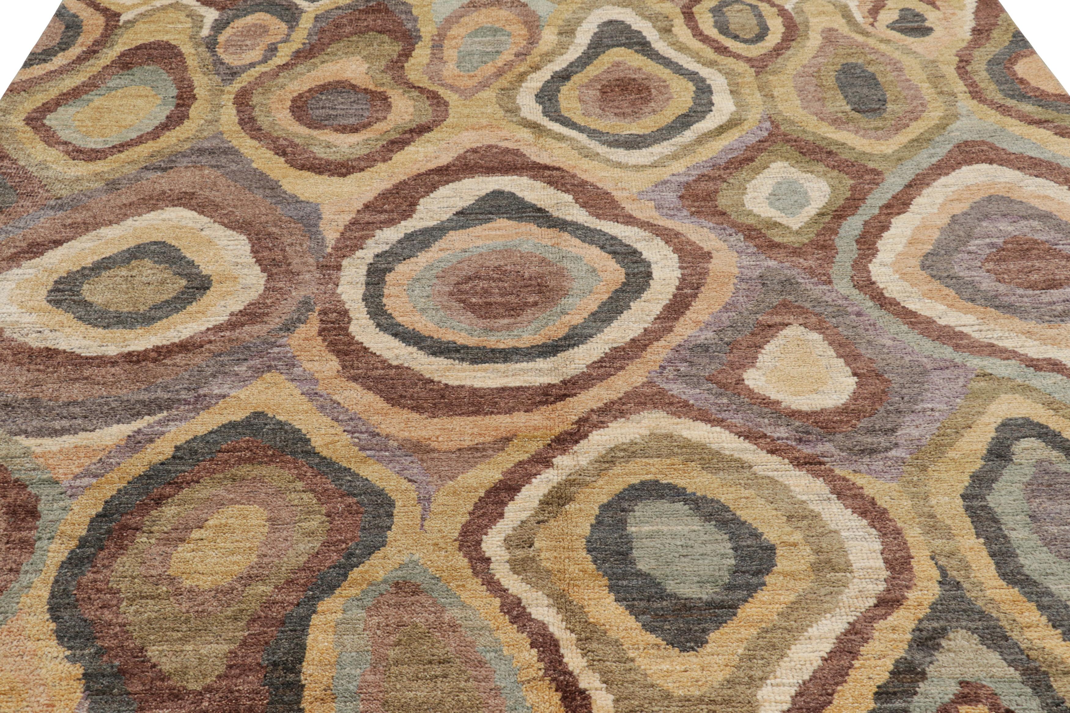 Hand-knotted in wool, this 8x10 abstract rug is the latest addition to Rug & Kilim’s coveted Modern Collection.  

On the Design: 

This particular piece features an earthy color palette composed of beige-brown, green, and cream hues arranged in