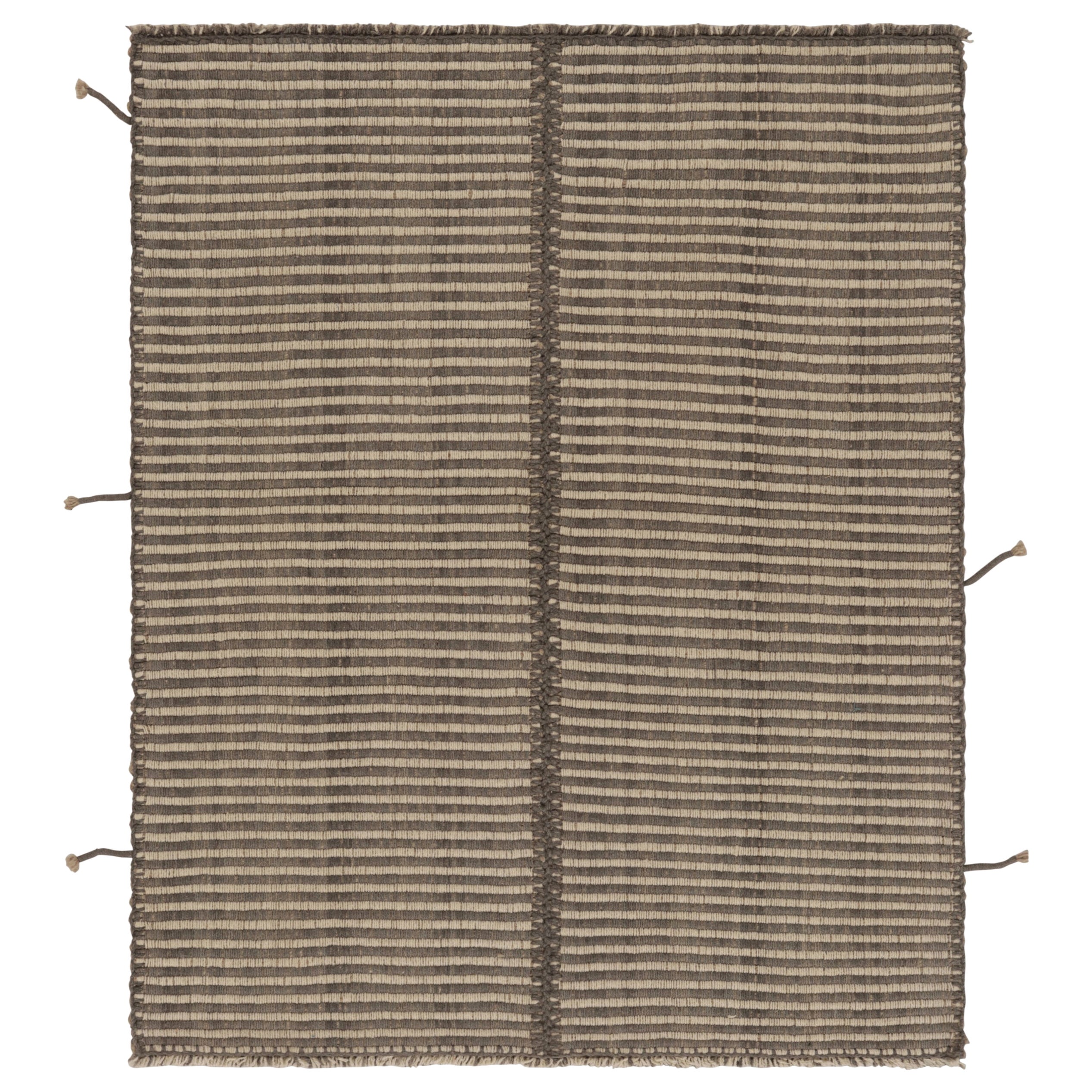 Rug
Kilim: Kilim d
accento con strisce testuali beige e marroni