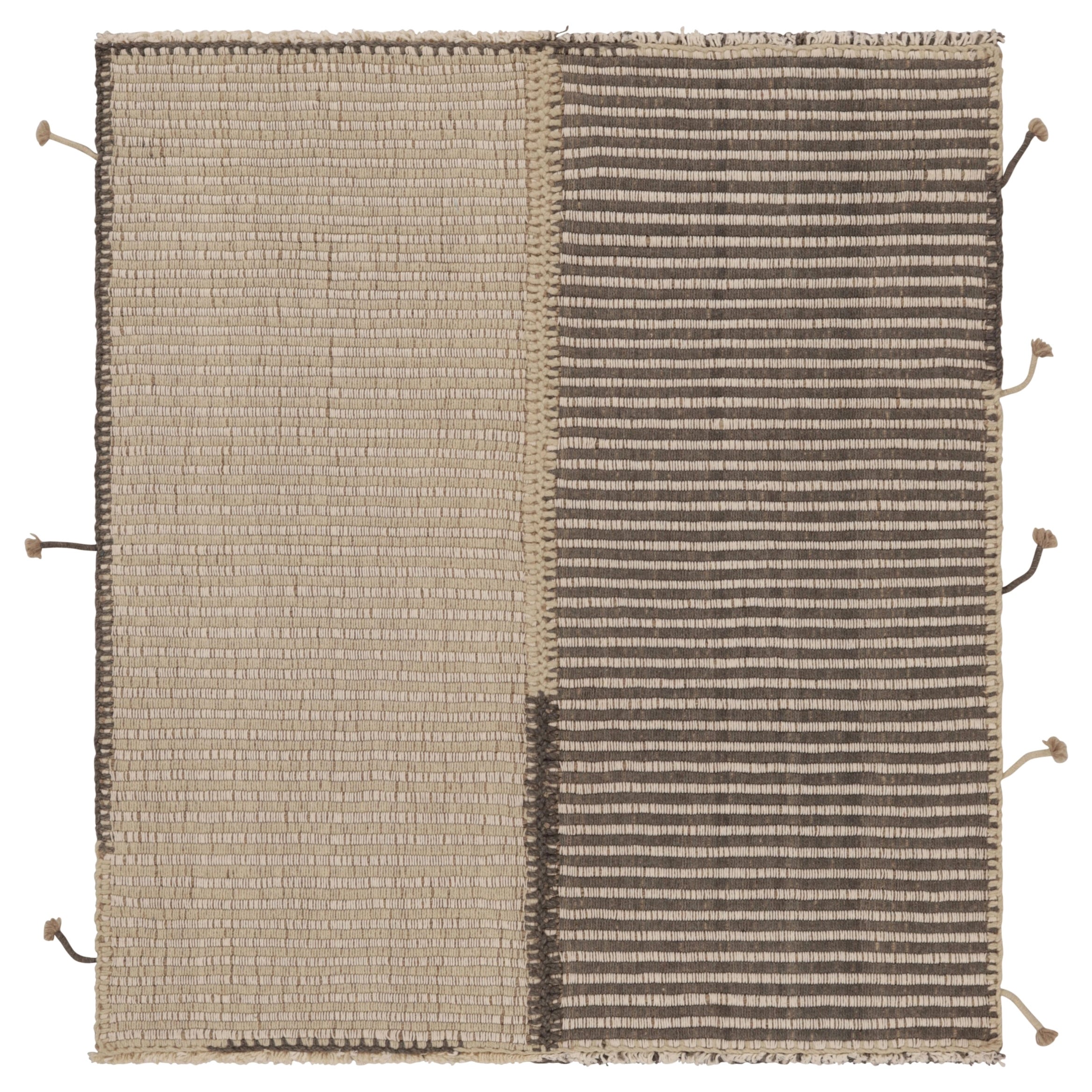 Rug
Kilim è un kilim d
accento con strisce testurizzate beige e grigie