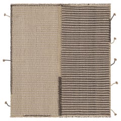 Rug
Kilim è un kilim d
accento con strisce testurizzate beige e grigie