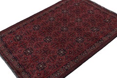 Rug & Kilim’s Afghan Baluch Tribal Rug in Burgundy and Blue Geometric Patterns