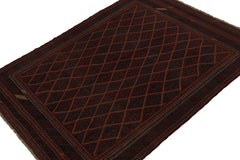 Rug & Kilim’s Afghan Baluch Tribal Rug in Red with Geometric Patterns